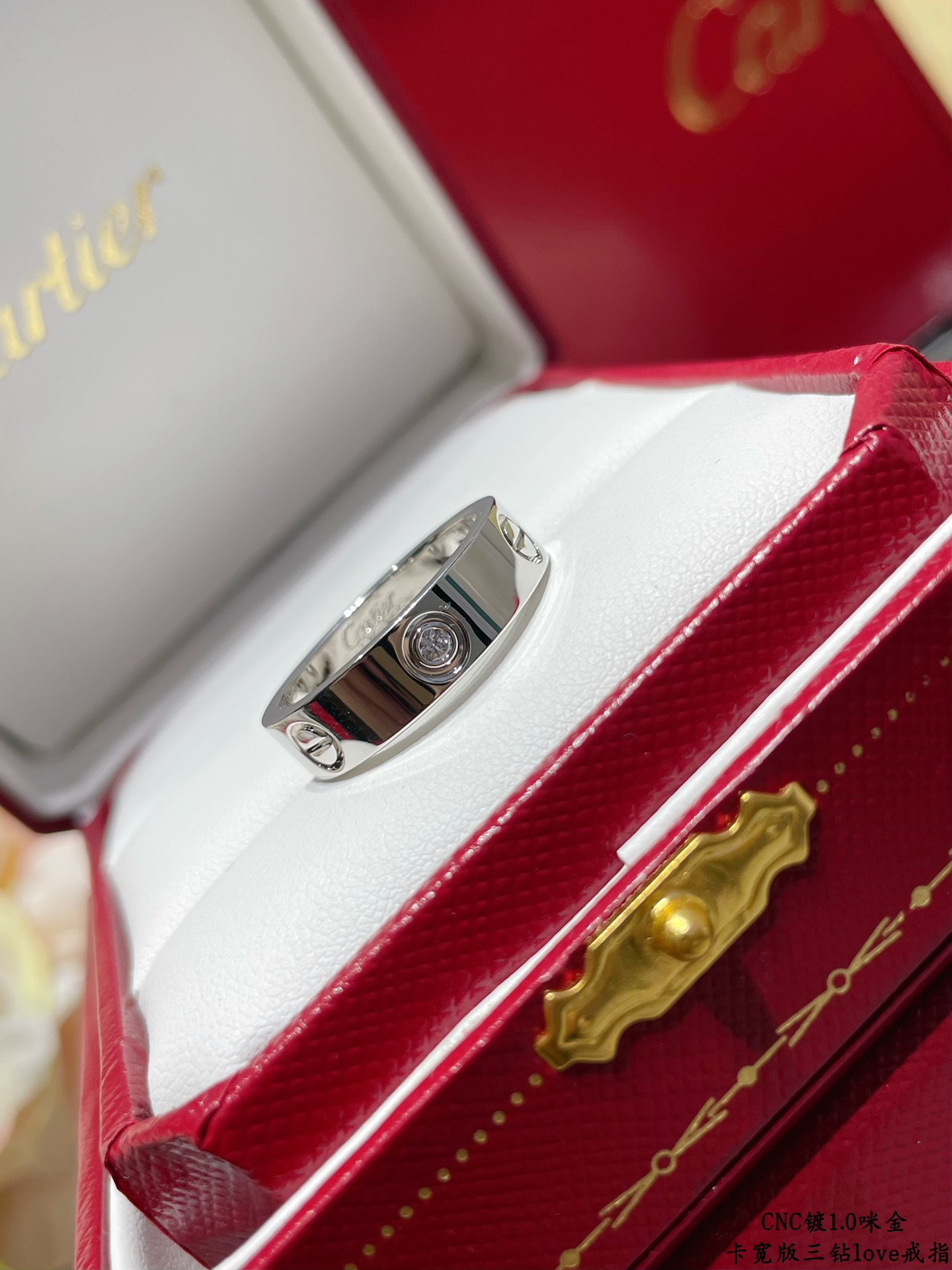 ca*t*er wide version three-Di*m*nd love ring