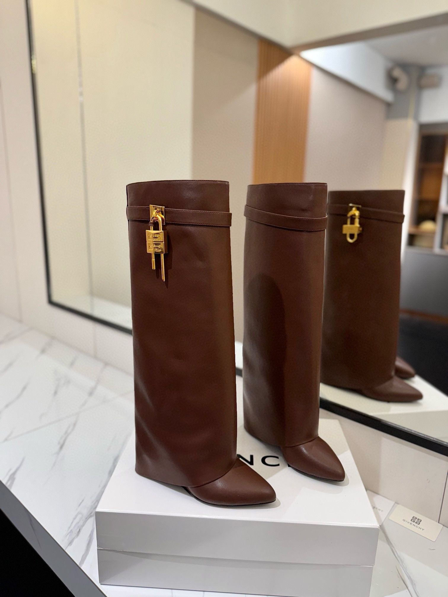 UA Givenchy Shark Lock boots in leather