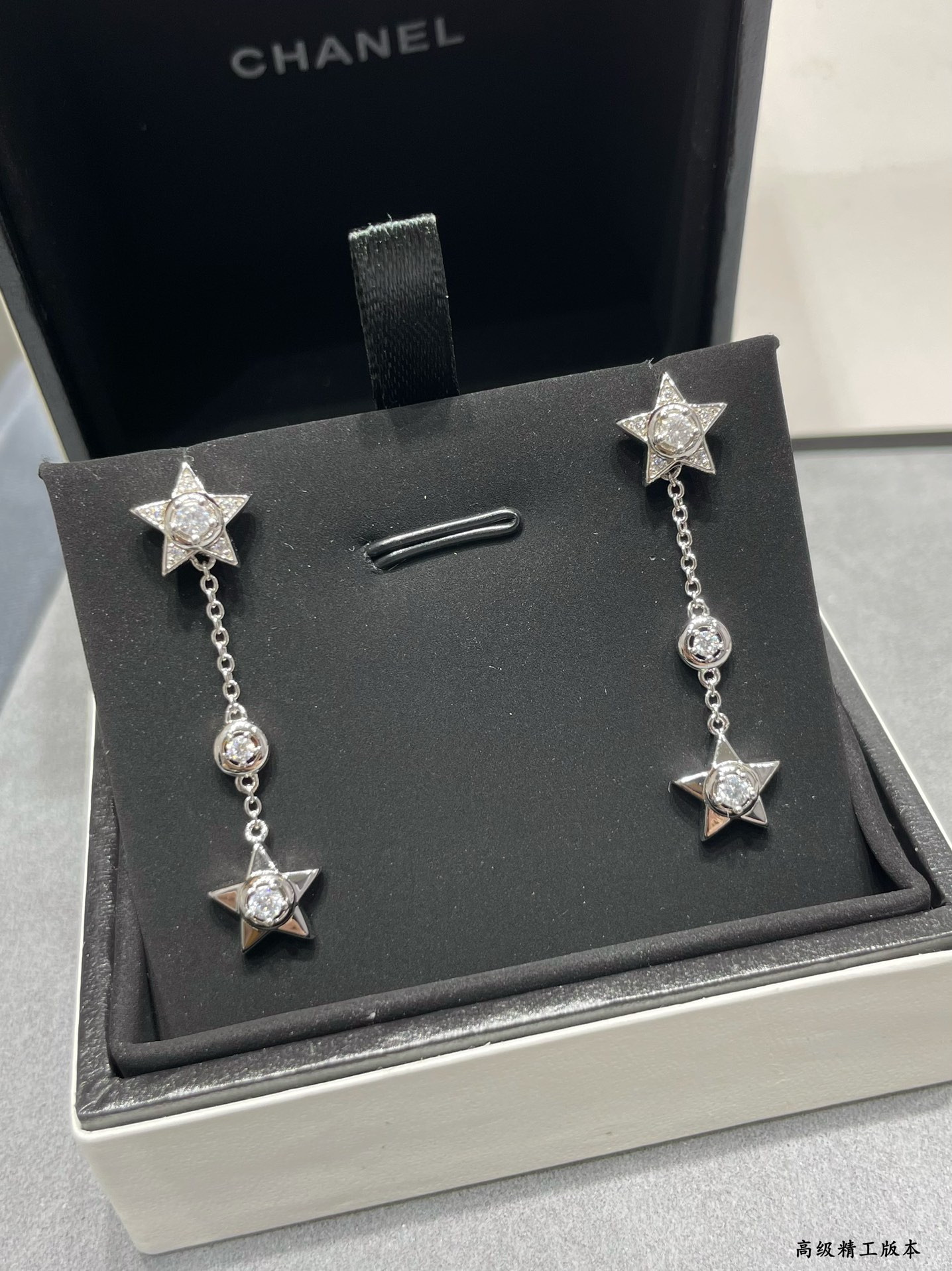 Ch*el hanging chain star earrings