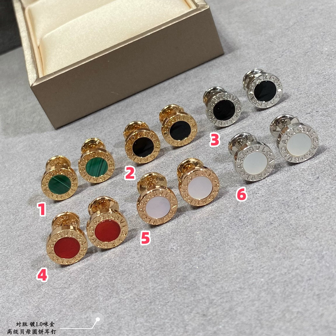 B*l*ai round cake earrings
