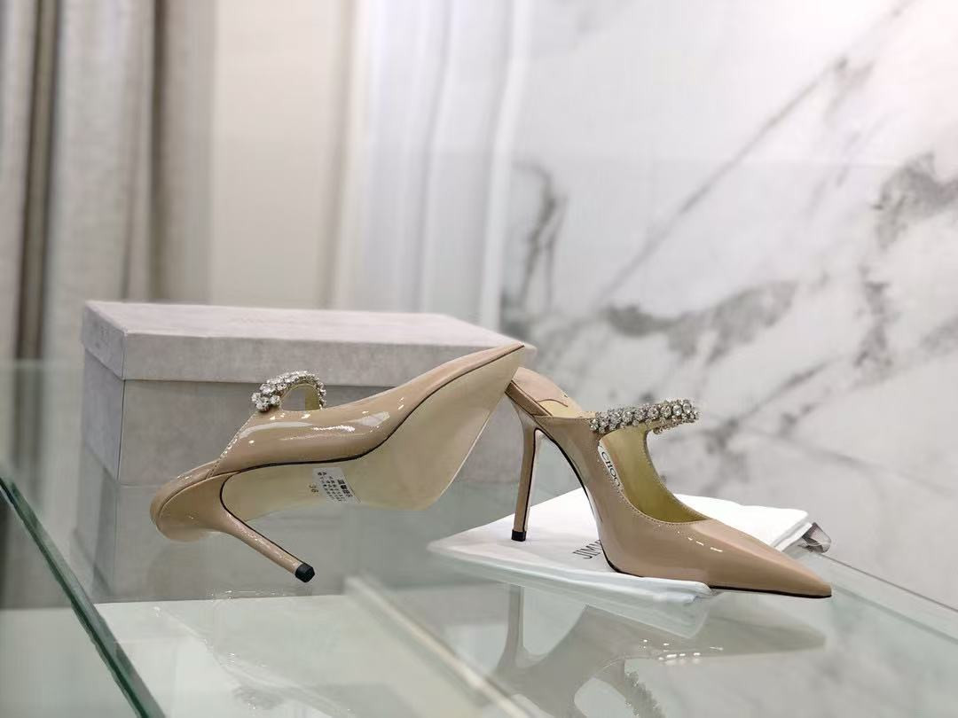 ua Ji*y Ch* mules en cuir bing