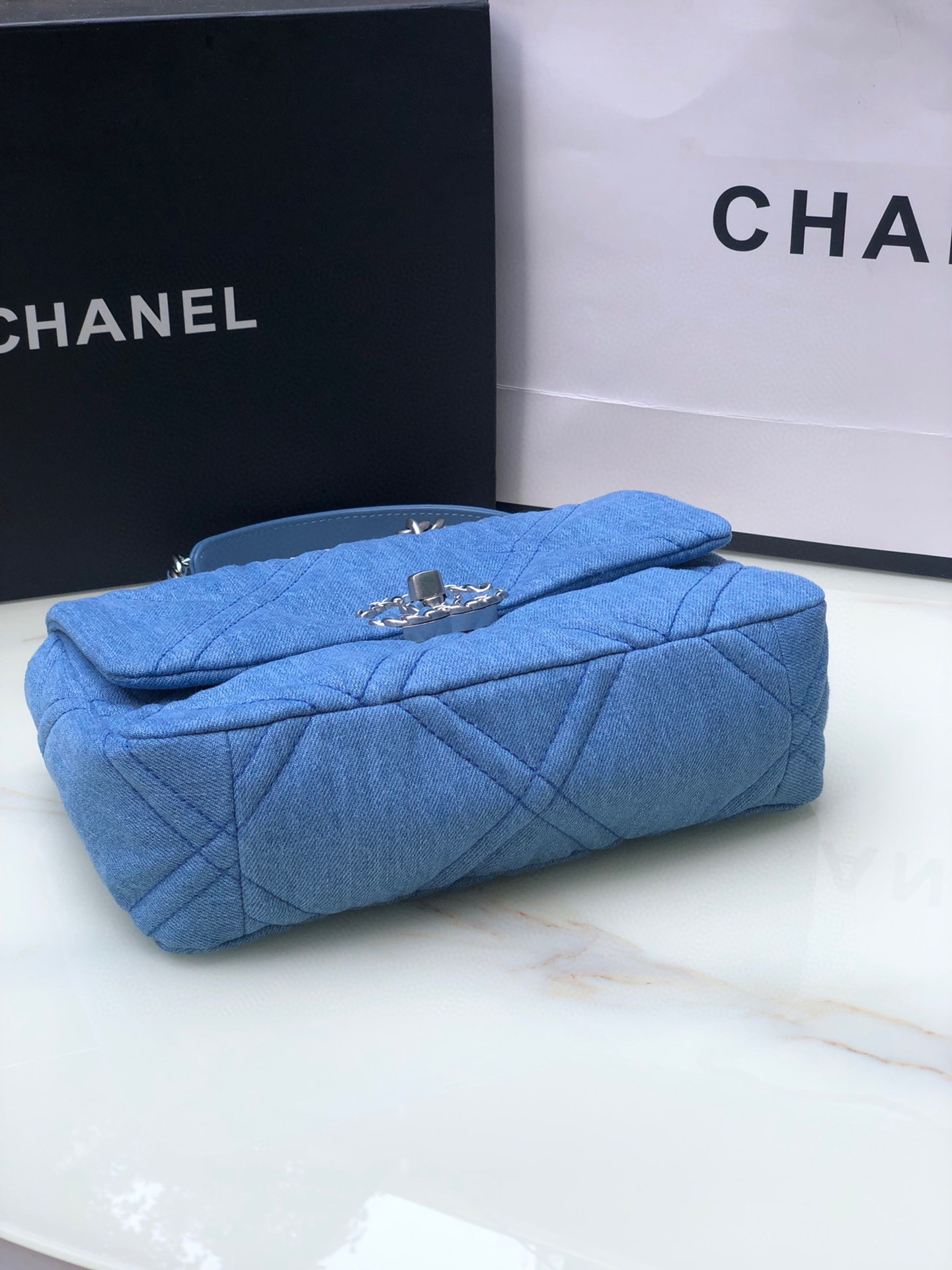 Ch*el 19 handbag, gold-tone, silver-tone & ruthenium-finish metal blue 6.2 × 10.1 × 3.5 in