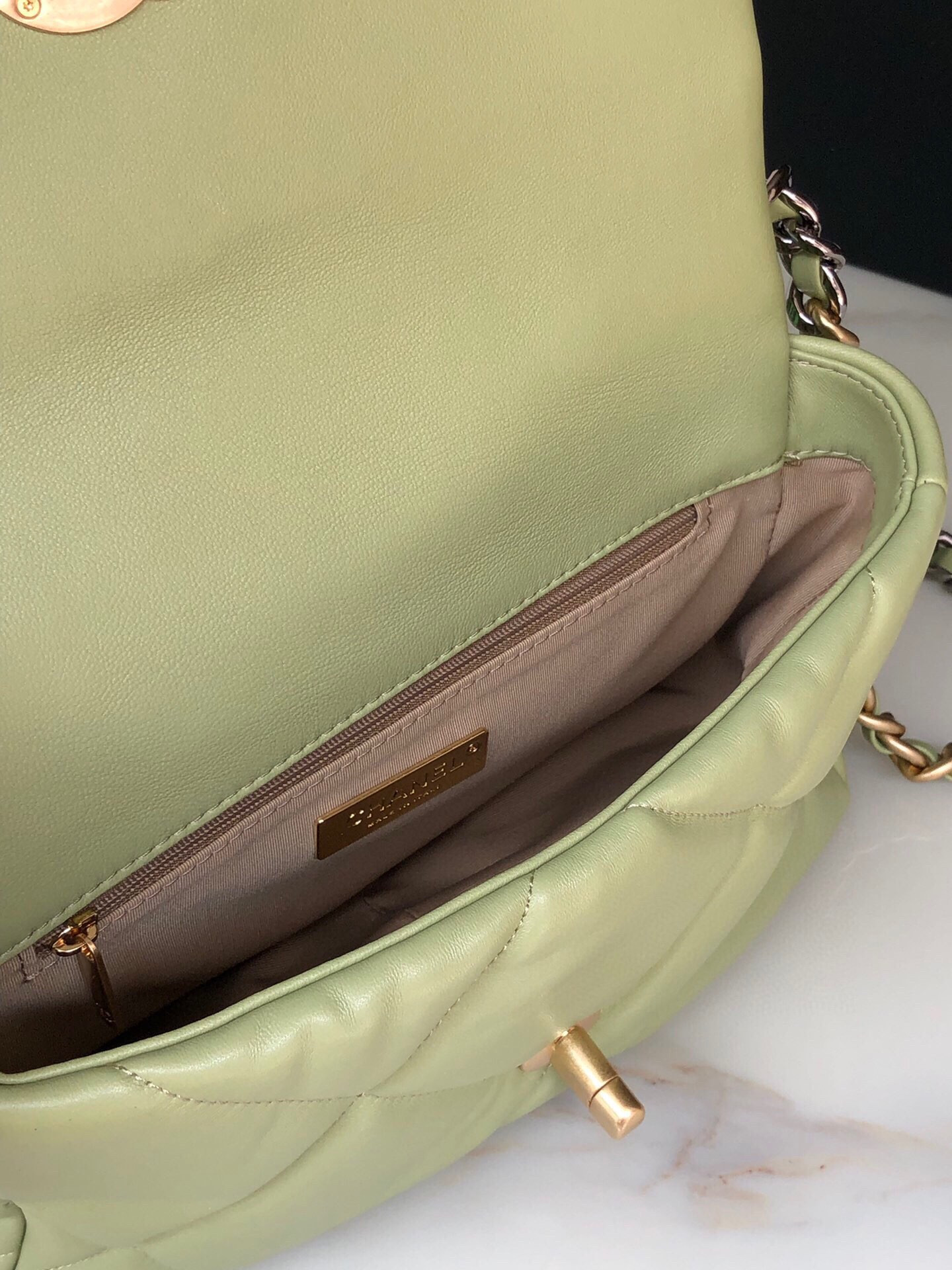 Ch*el 19 handbag shiny leather, gold-tone, silver-tone & ruthenium-finish metal light green 6.2 × 10.1 × 3.5 in