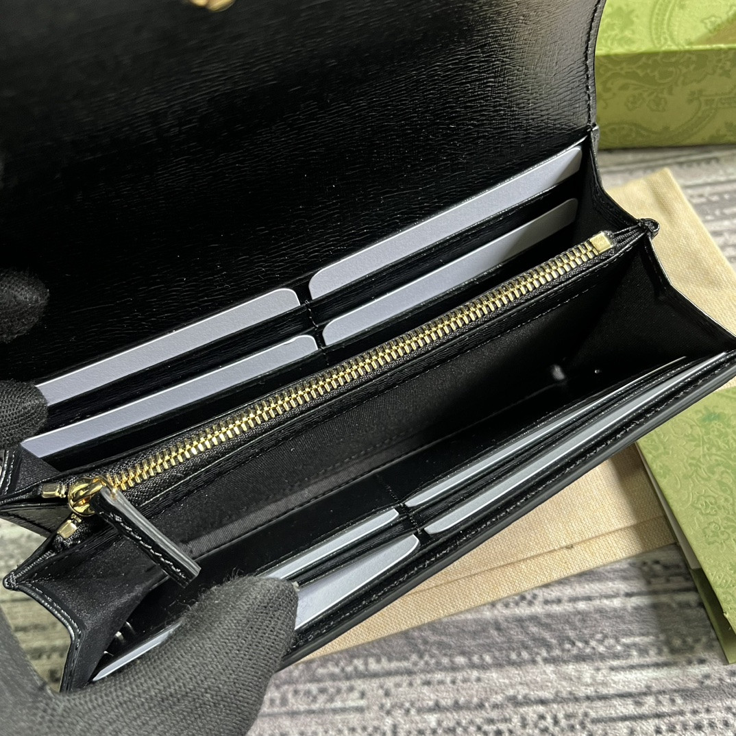 continental wallet with G*u*i script 7.5"w x 4"h x 1.4"d