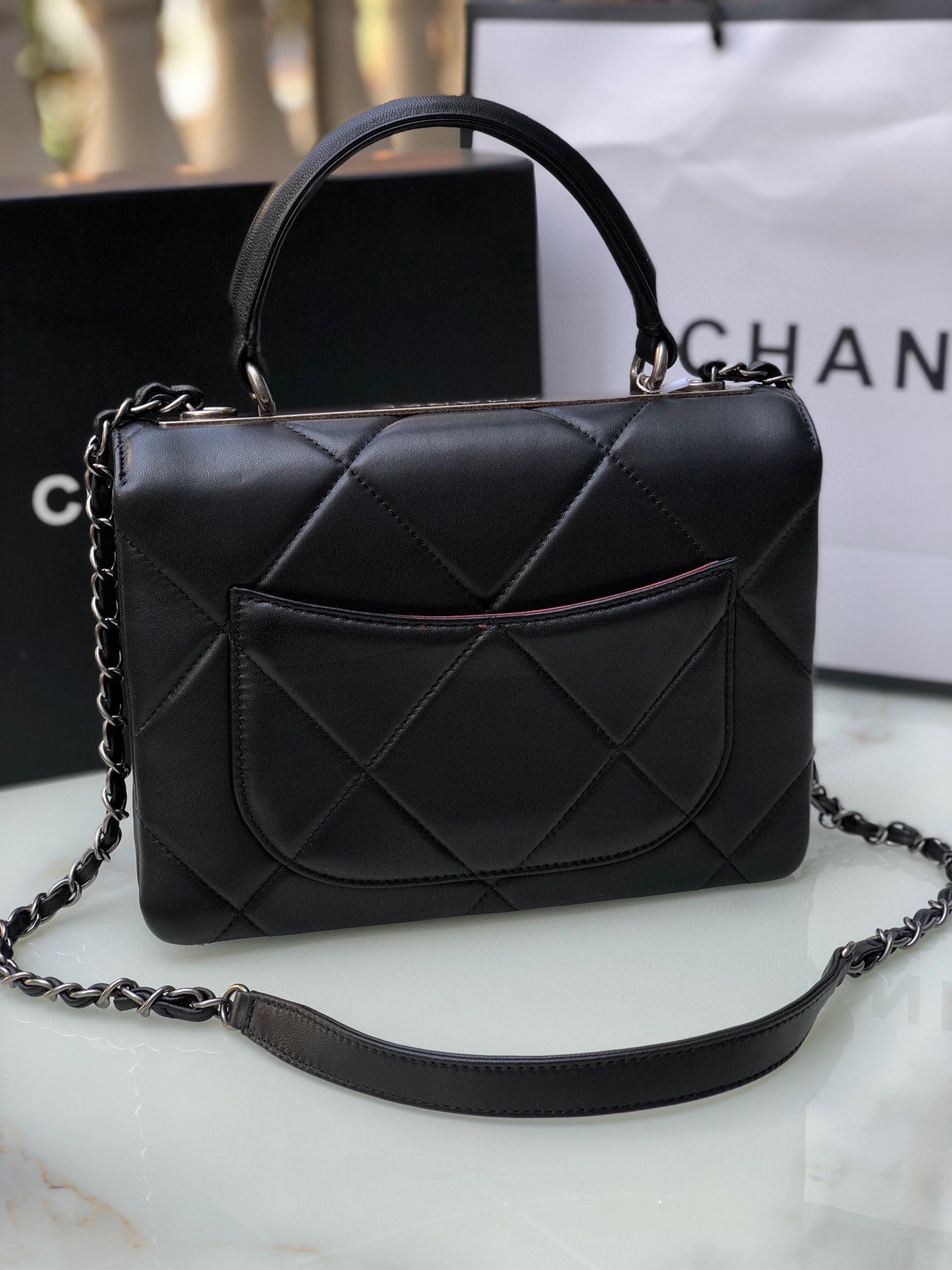 Ch*el flap bag with top handle 6.6 × 9.8 × 4.7 in
