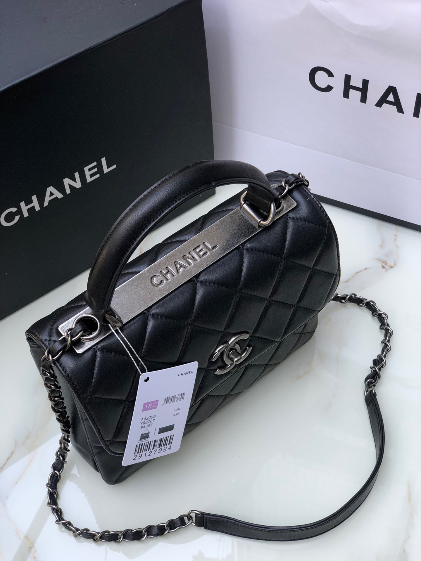 Ch*el flap bag with top handle 6.6 × 9.8 × 4.7 in