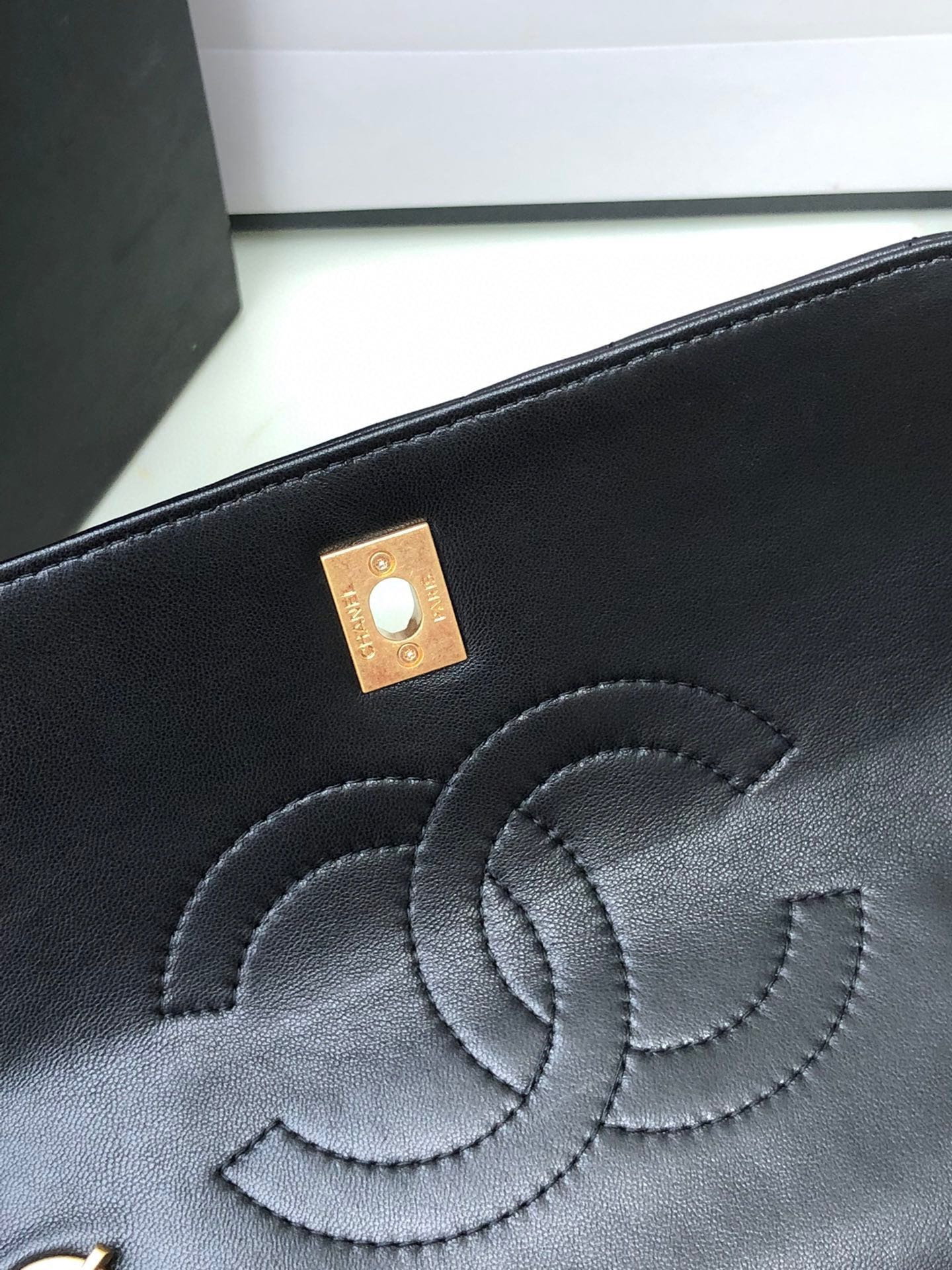 Ch*el flap bag with top handle 6.6 × 9.8 × 4.7 in
