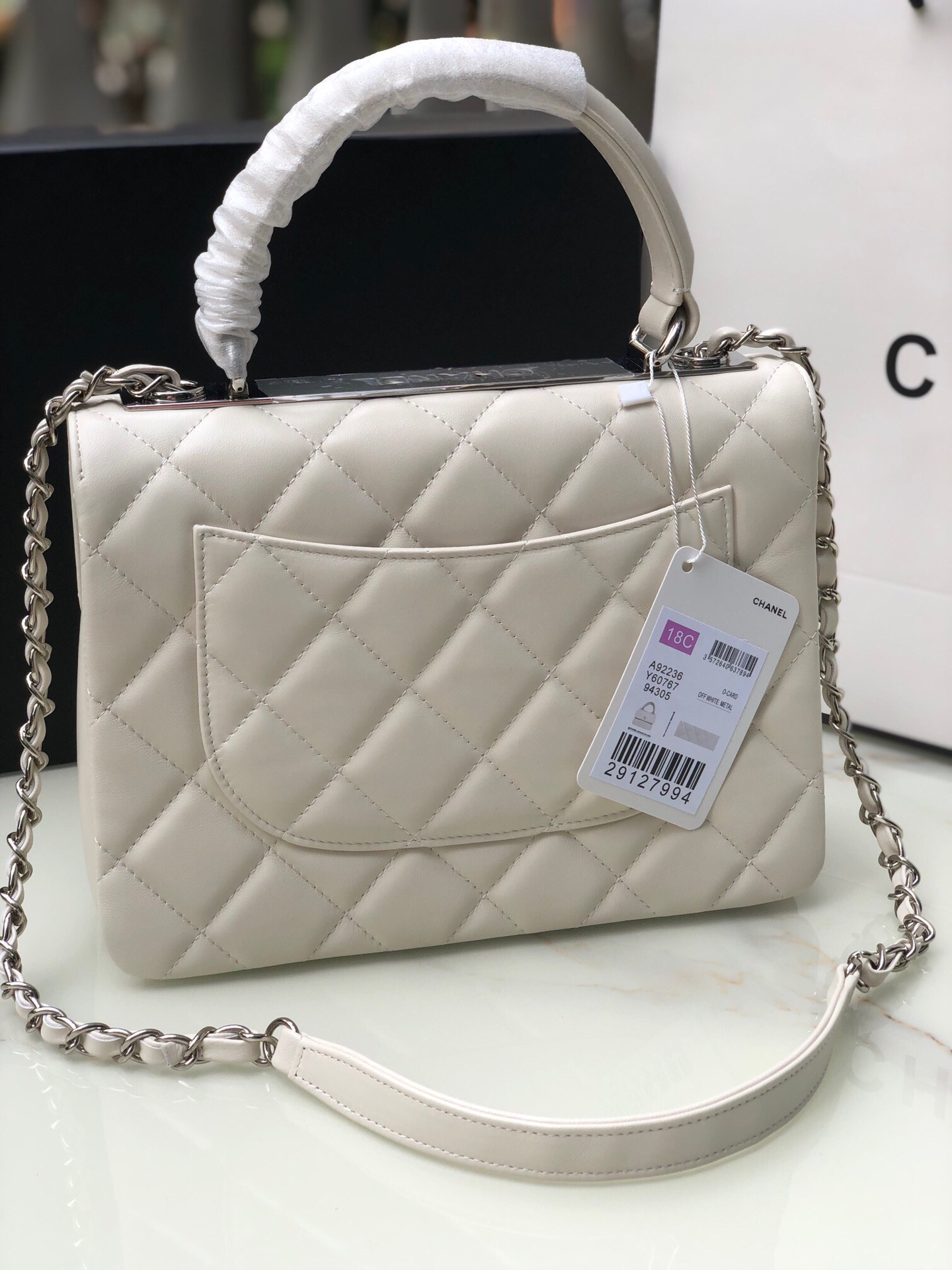Ch*el flap bag with top handle 6.6 × 9.8 × 4.7 in