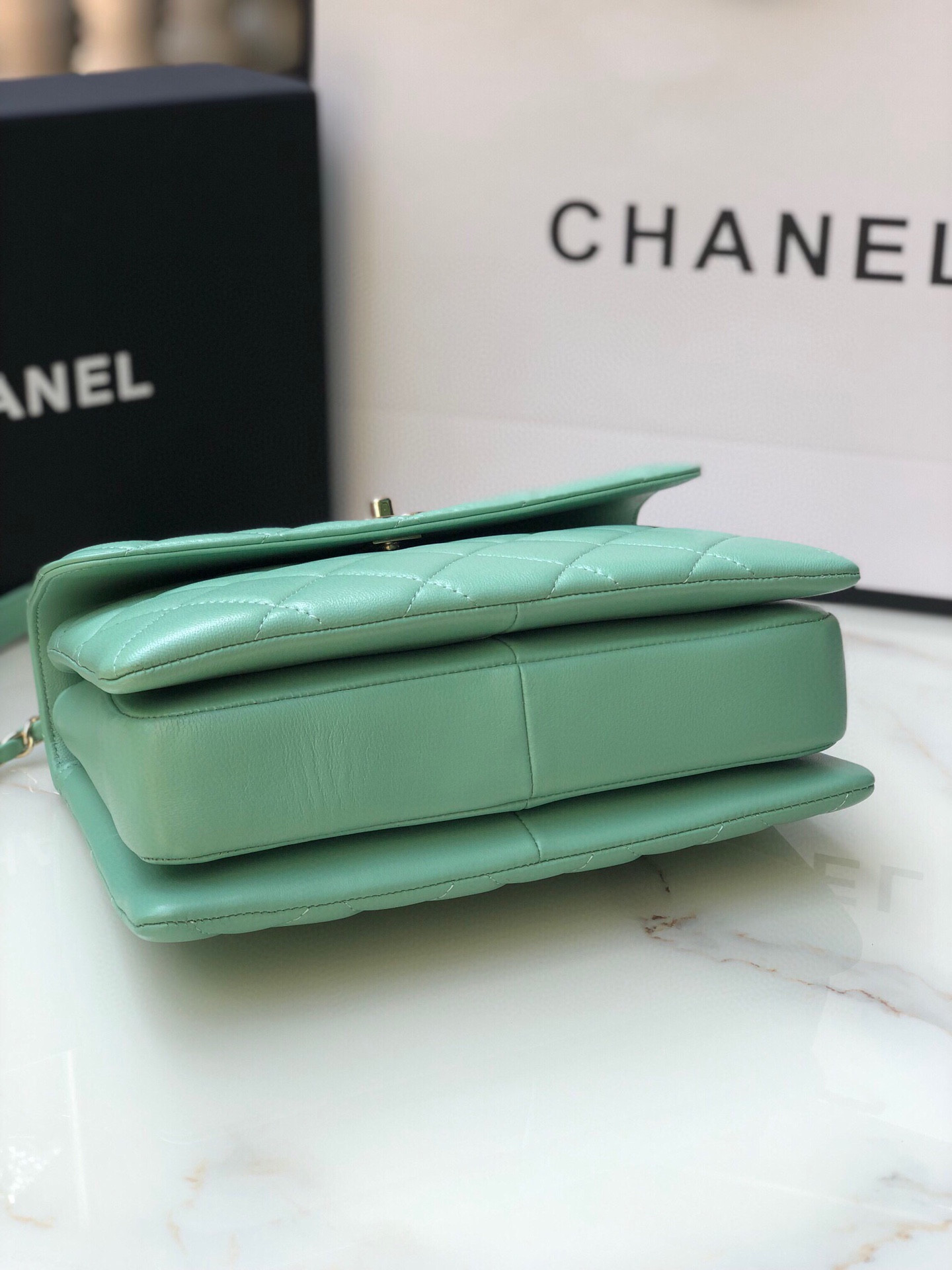 Ch*el flap bag with top handle 6.6 × 9.8 × 4.7 in
