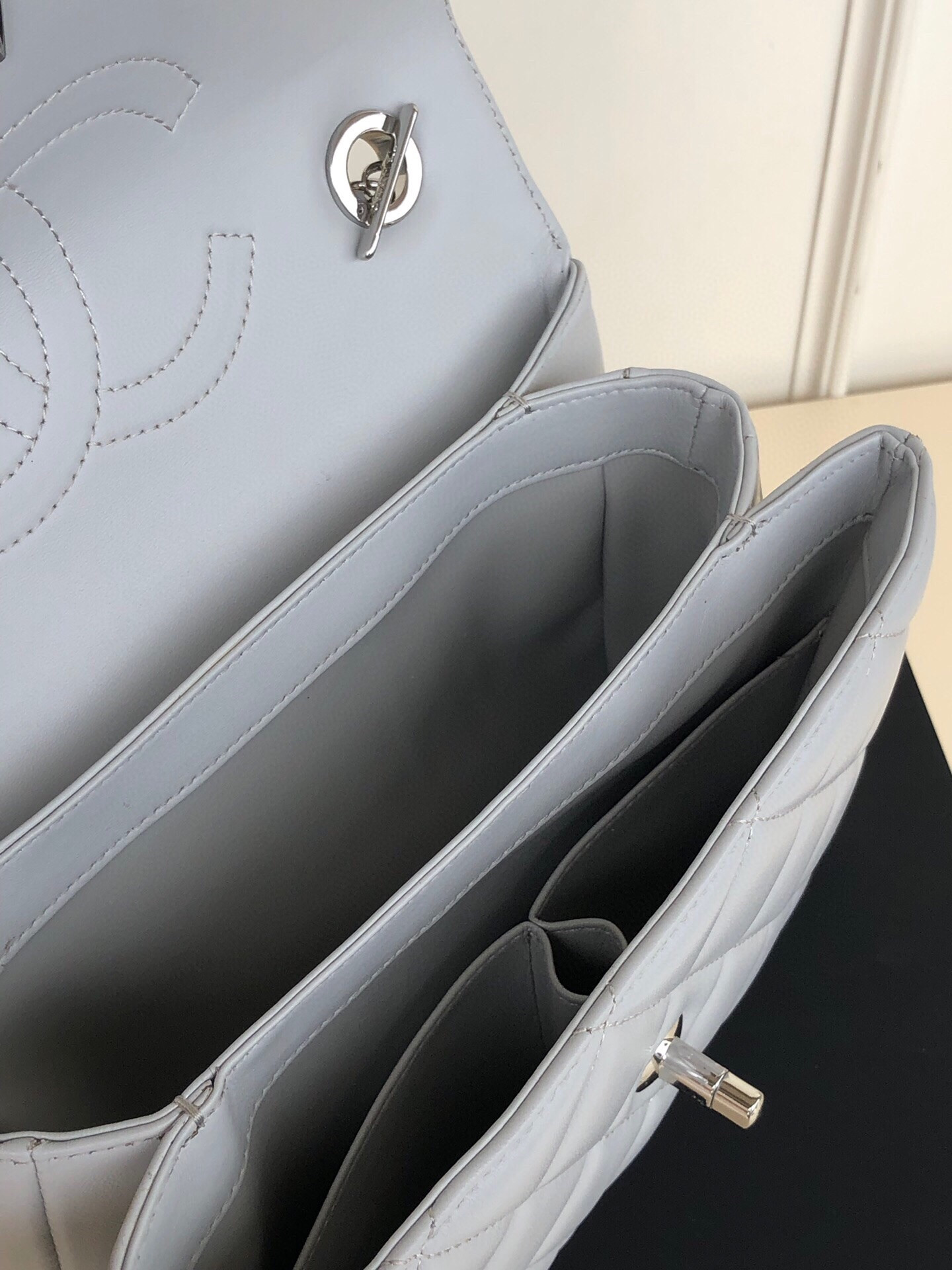 Ch*el flap bag with top handle 6.6 × 9.8 × 4.7 in