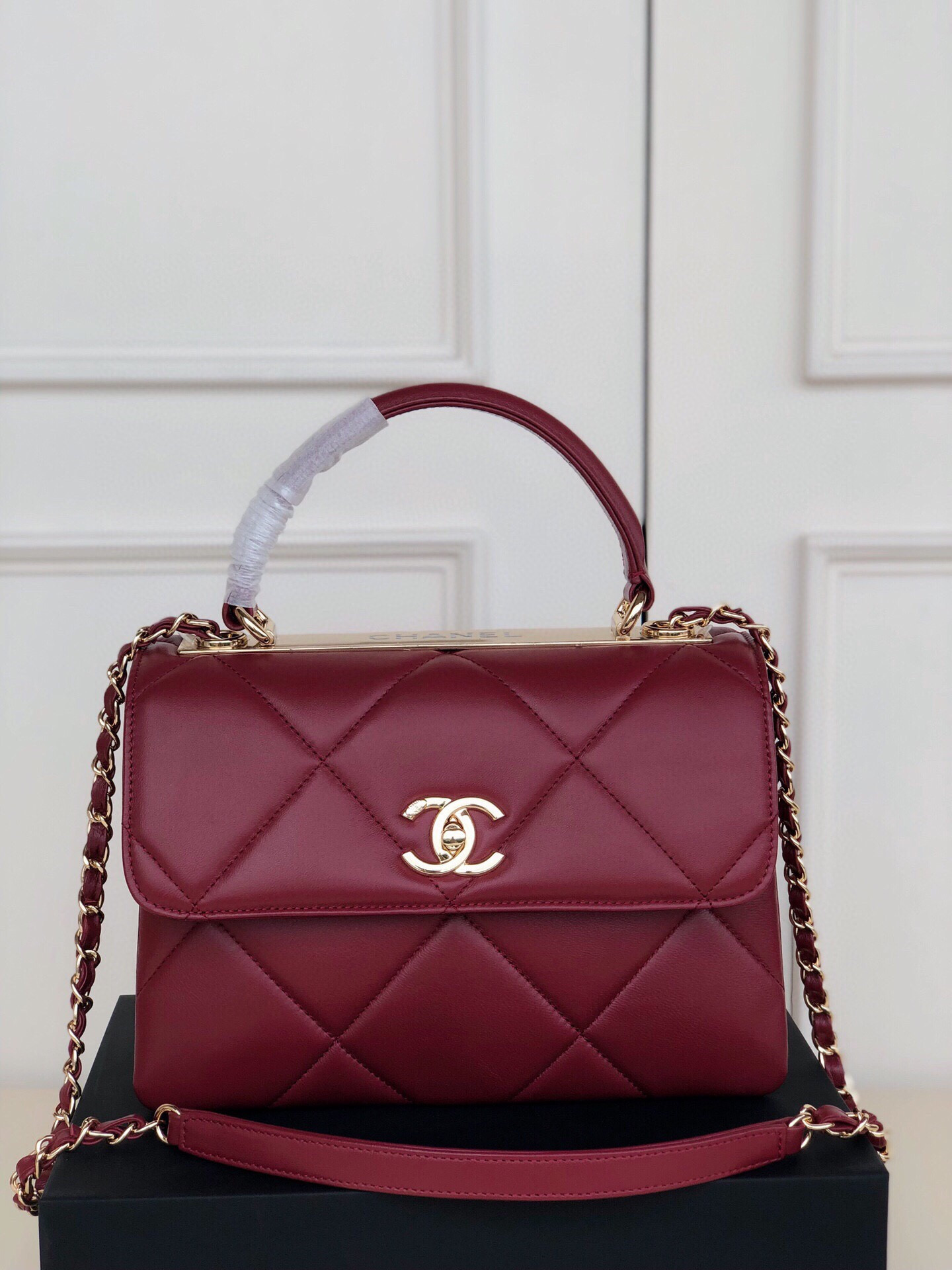 Ch*el flap bag with top handle 6.6 × 9.8 × 4.7 in