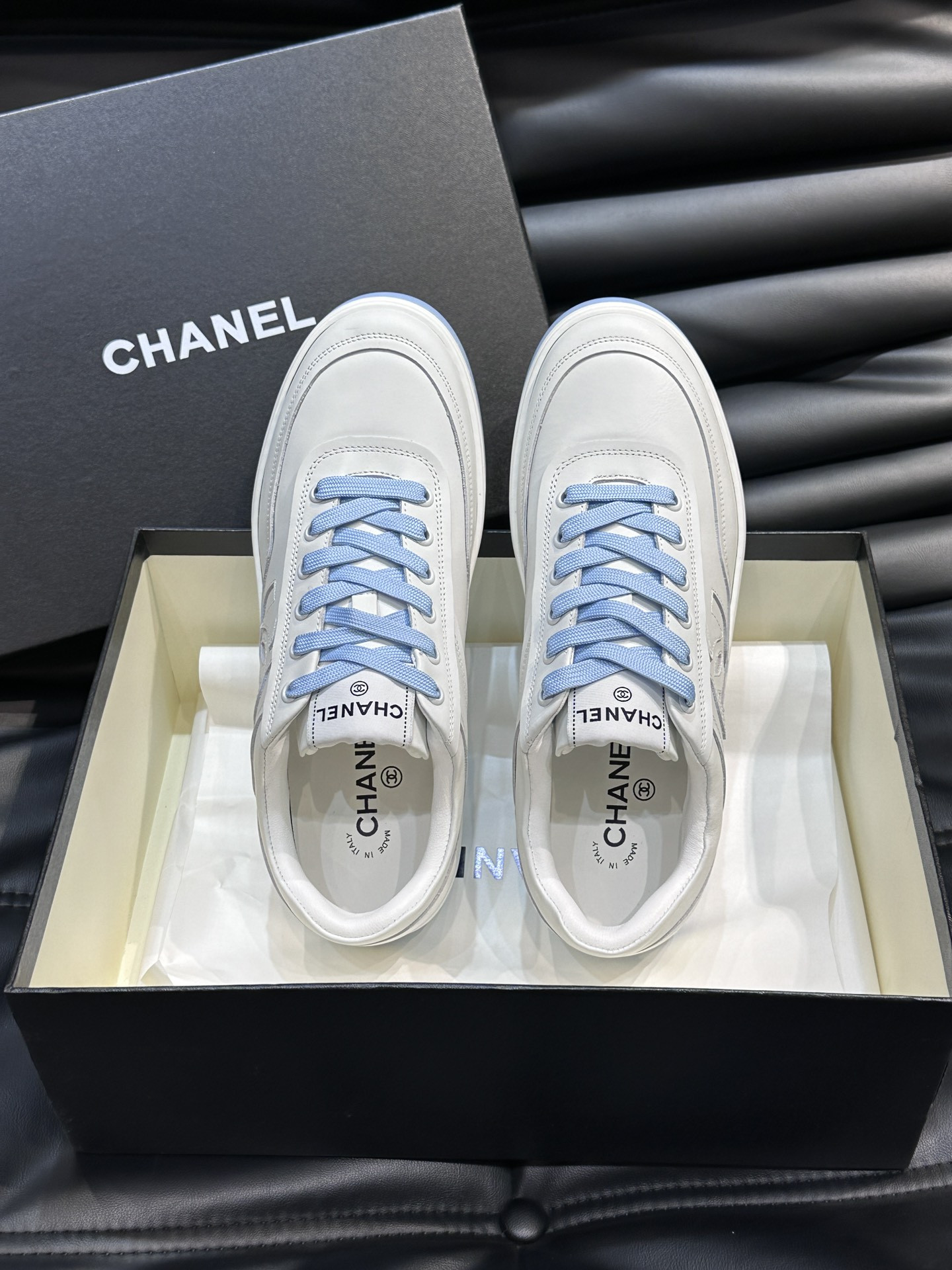 ua Ch*el sneaker calfskin