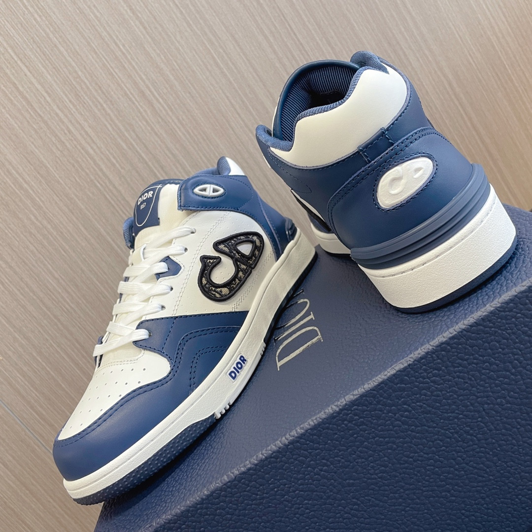 ua D*or b57 mid-top sneaker navy blue and white
