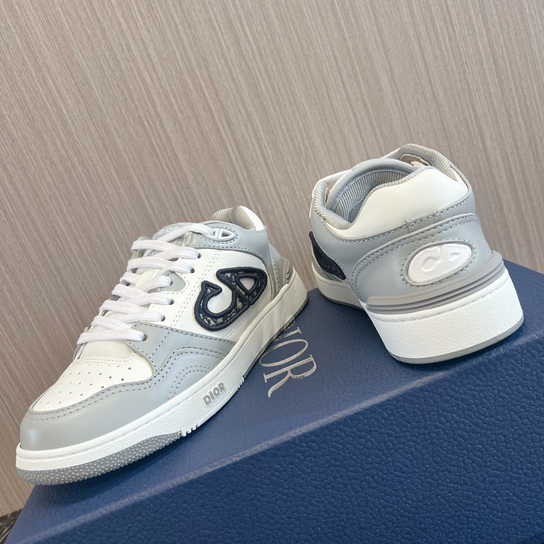 ua D*or b57 low-top sneaker  gray and white