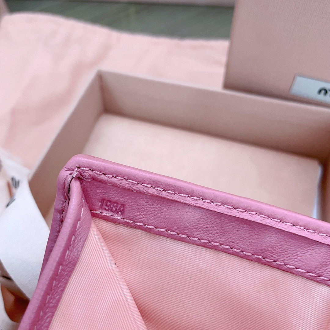 Miu Miu Small matelassé nappa leather wallet 11.2x8.5cm