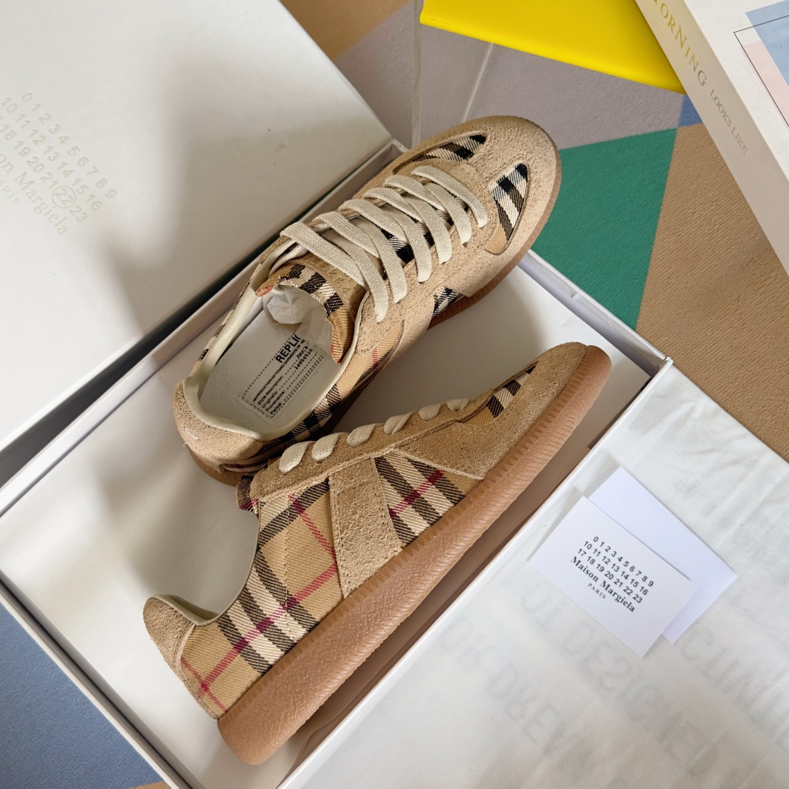 ua ma*s*n Ma*i*la mm6 sneakers