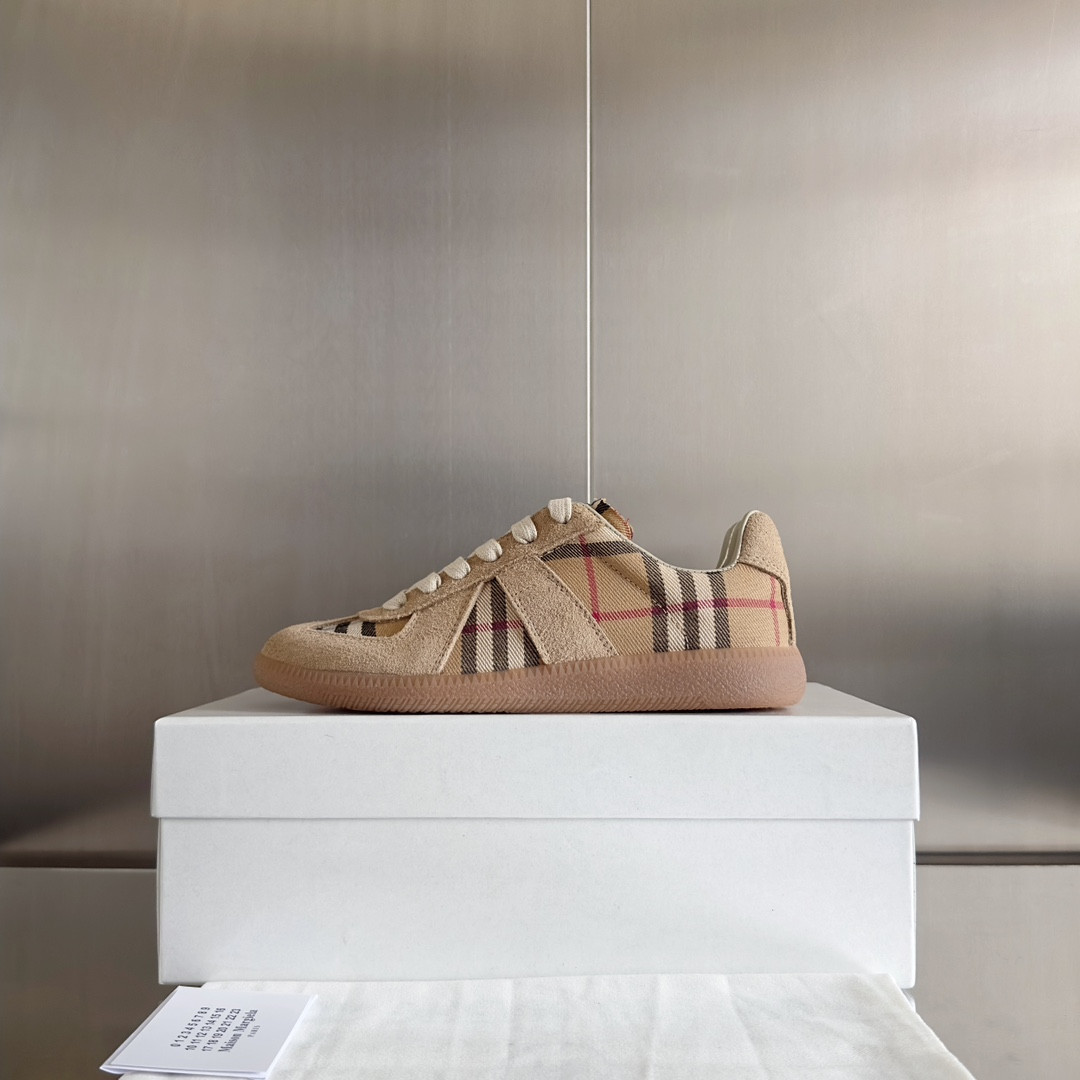 ua ma*s*n Ma*i*la mm6 sneakers