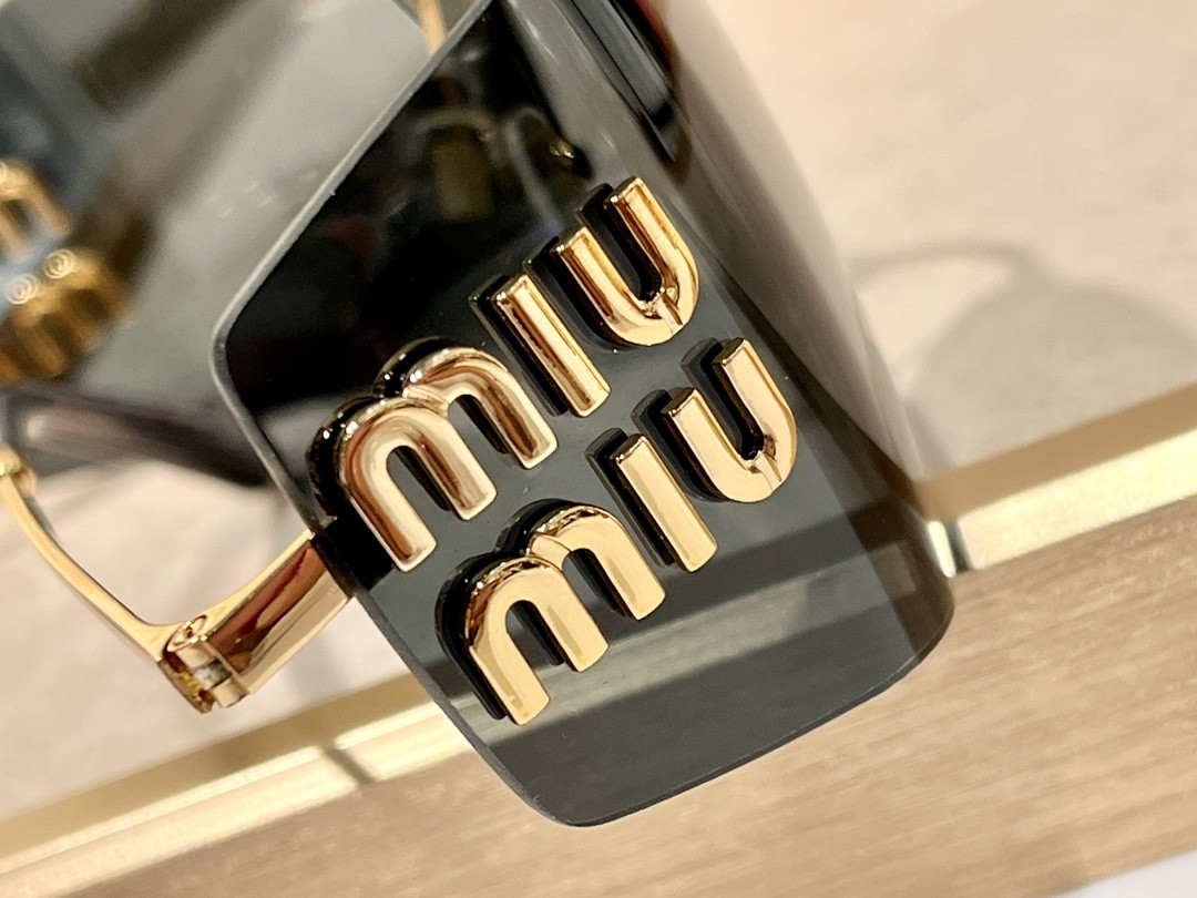 Miu Miu Glasses SMU54Y