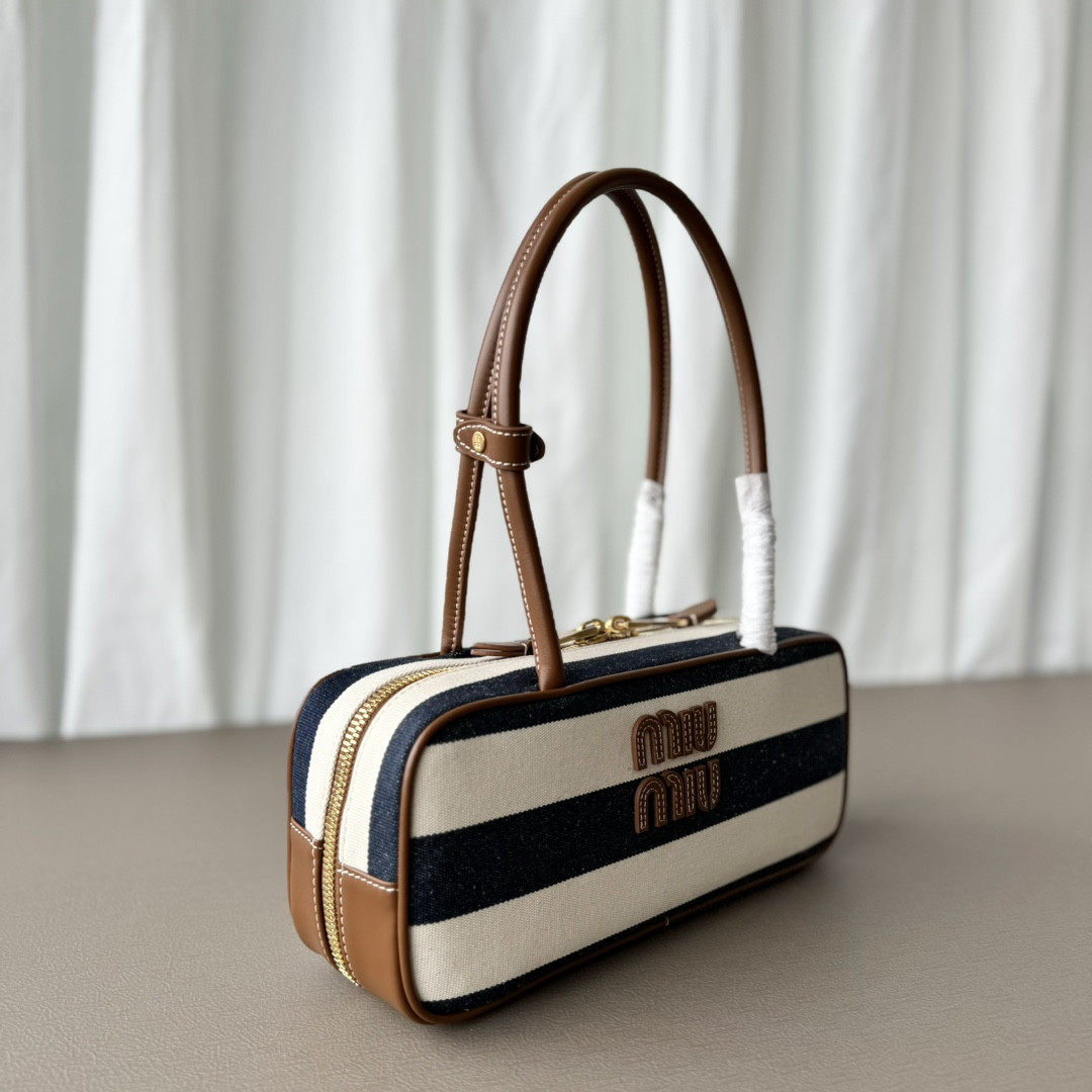 Miu Miu Beau canvas and leather bag 11.5x28x8cm