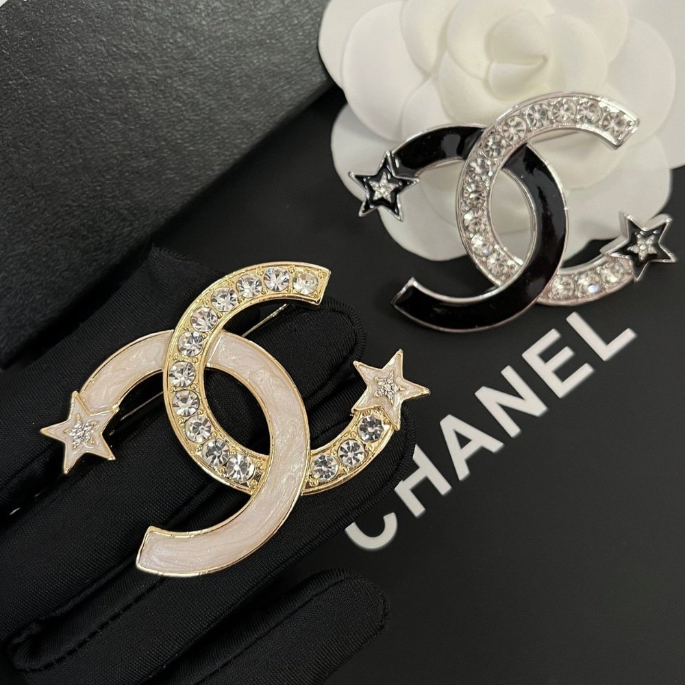 Ch**el Cc Brooch Silver And Black With Two Small Stars
