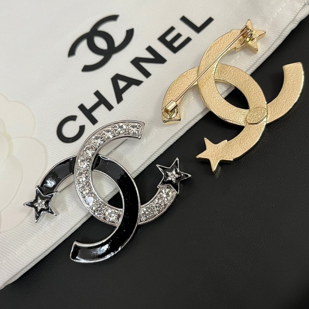 Ch**el Cc Brooch Silver And Black With Two Small Stars