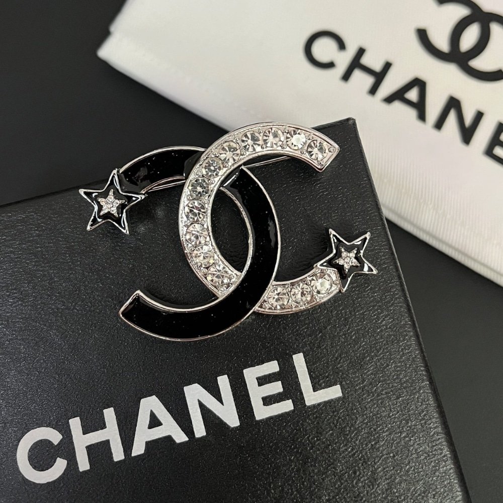 Ch**el Cc Brooch Silver And Black With Two Small Stars