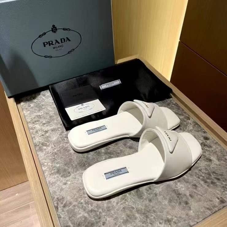 Pra*a Brushed Leather Slide In White