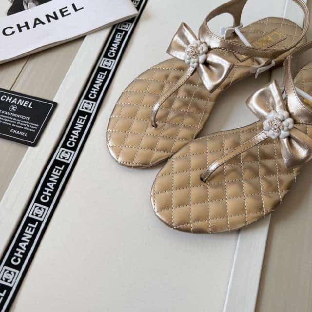 Ch**el Gold Quilted Leather With White Camellia Cc Logo Bow Thong Sandals