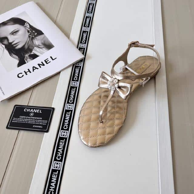 Ch**el Gold Quilted Leather With White Camellia Cc Logo Bow Thong Sandals