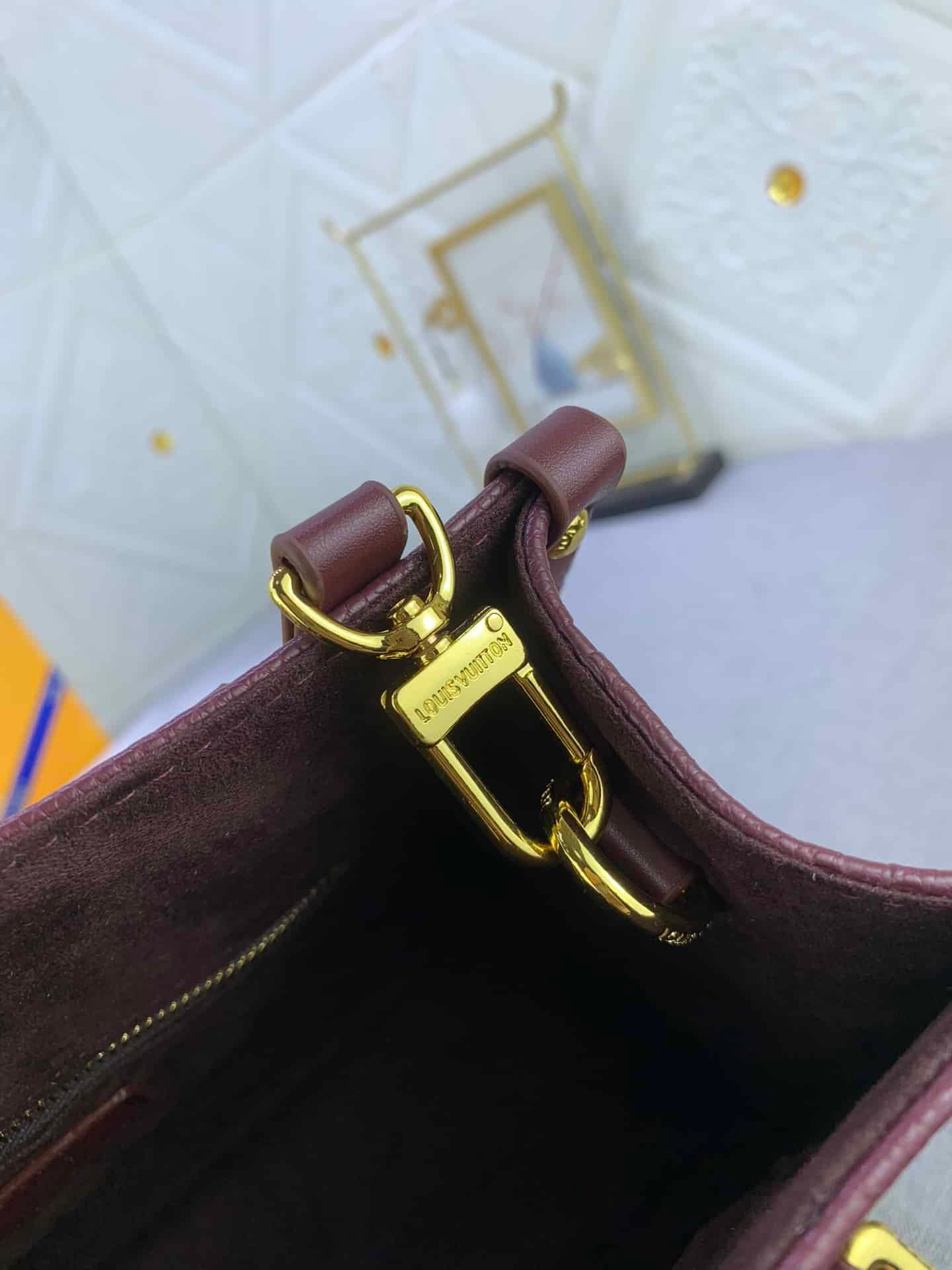 L0vis Vvtt0n Onthego Mm Monogram Empreinte Wine Red 25Cm M46601