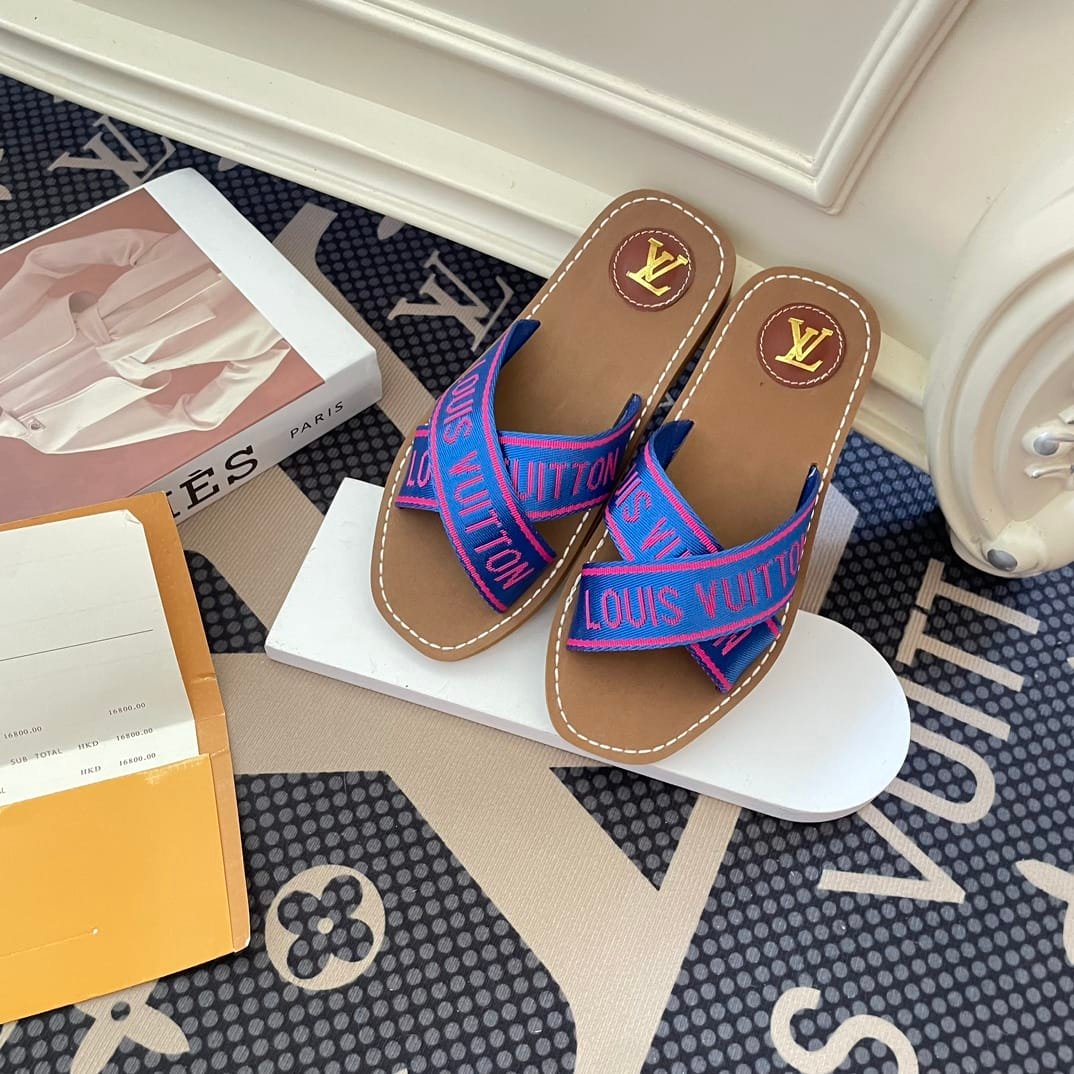 L0vis Vvtt0n Cross Strap Flat Slides Blue