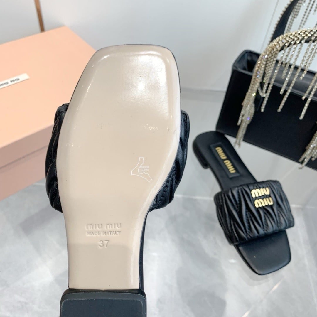 M1um1u Matelassé Nappa Leather Slides Black