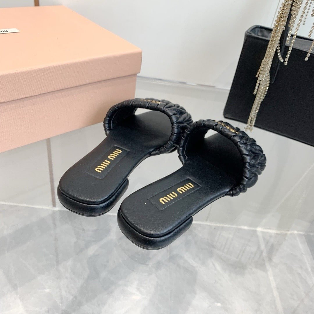 M1um1u Matelassé Nappa Leather Slides Black