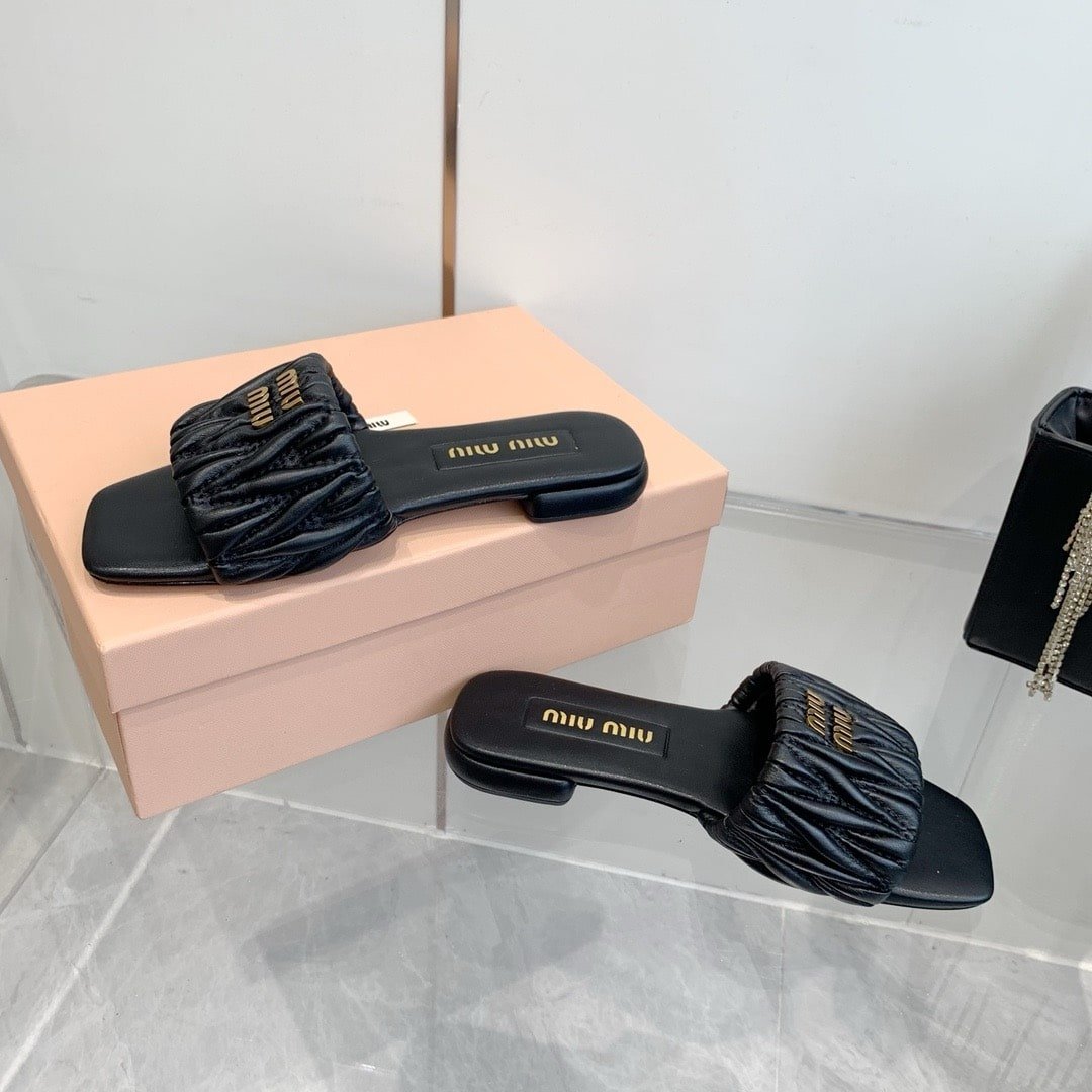 M1um1u Matelassé Nappa Leather Slides Black