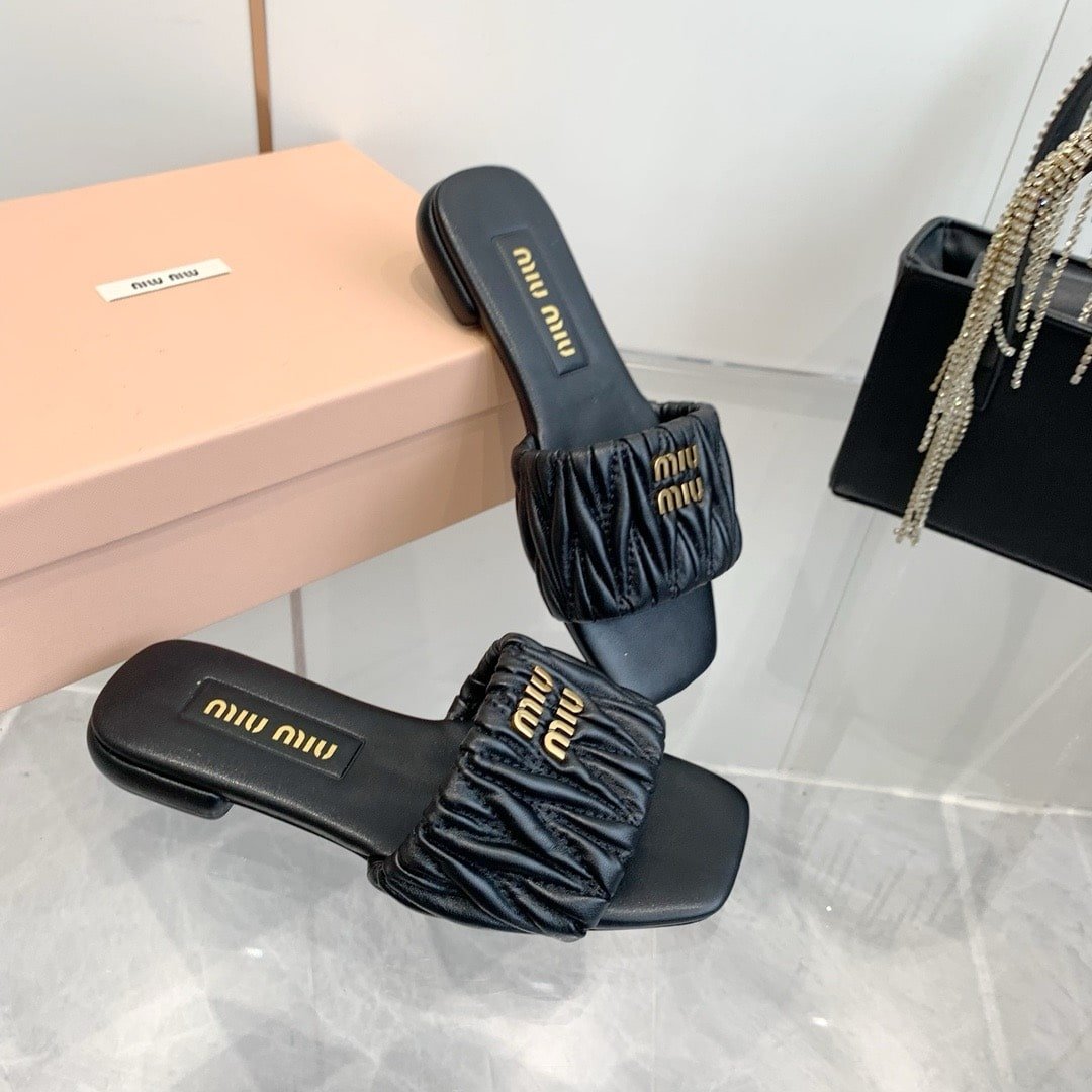 M1um1u Matelassé Nappa Leather Slides Black