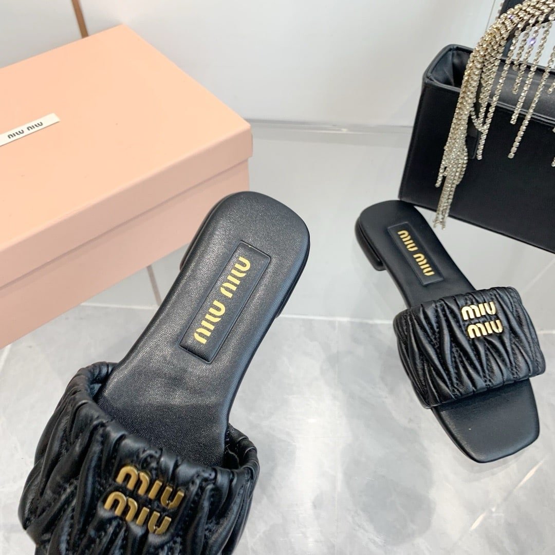 M1um1u Matelassé Nappa Leather Slides Black