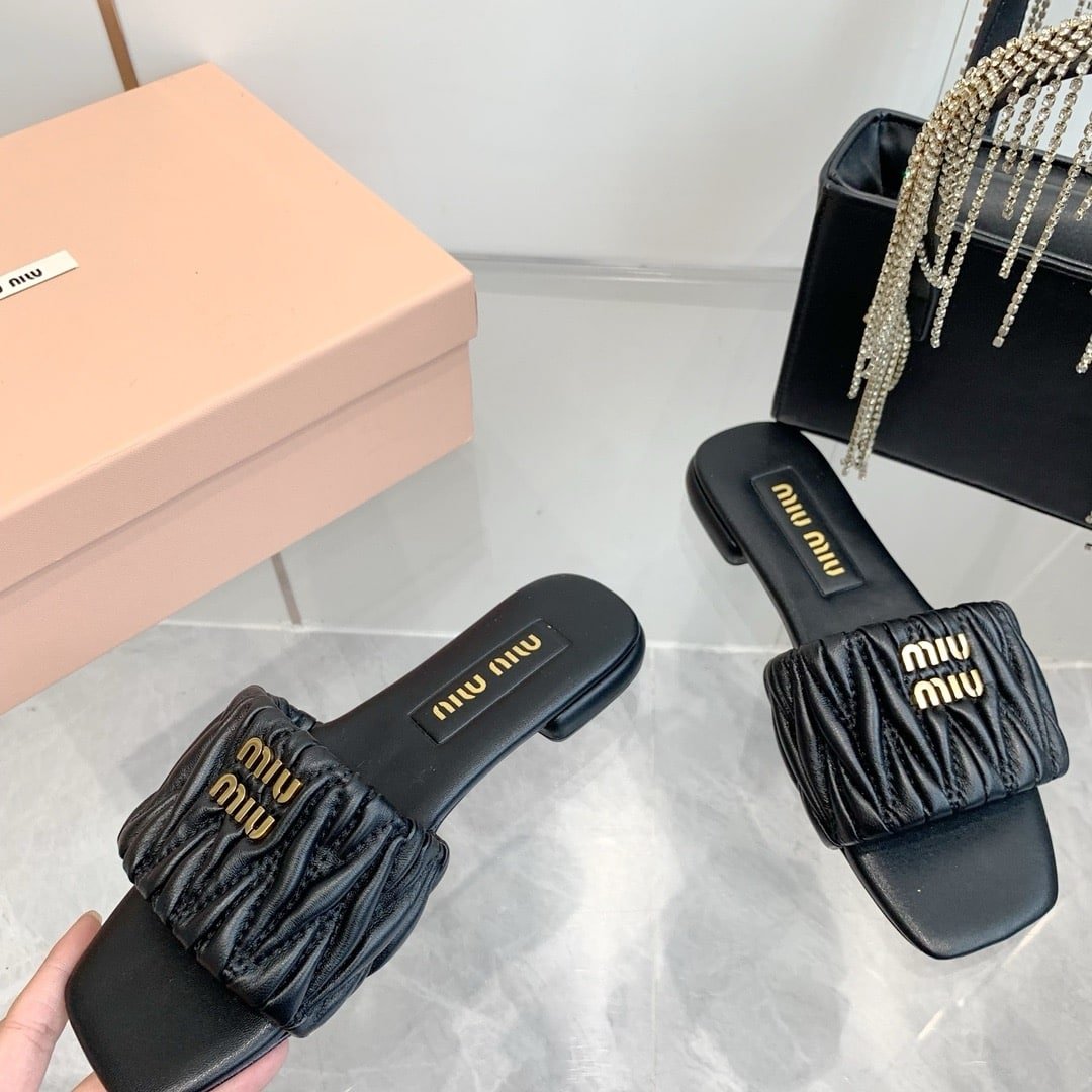 M1um1u Matelassé Nappa Leather Slides Black