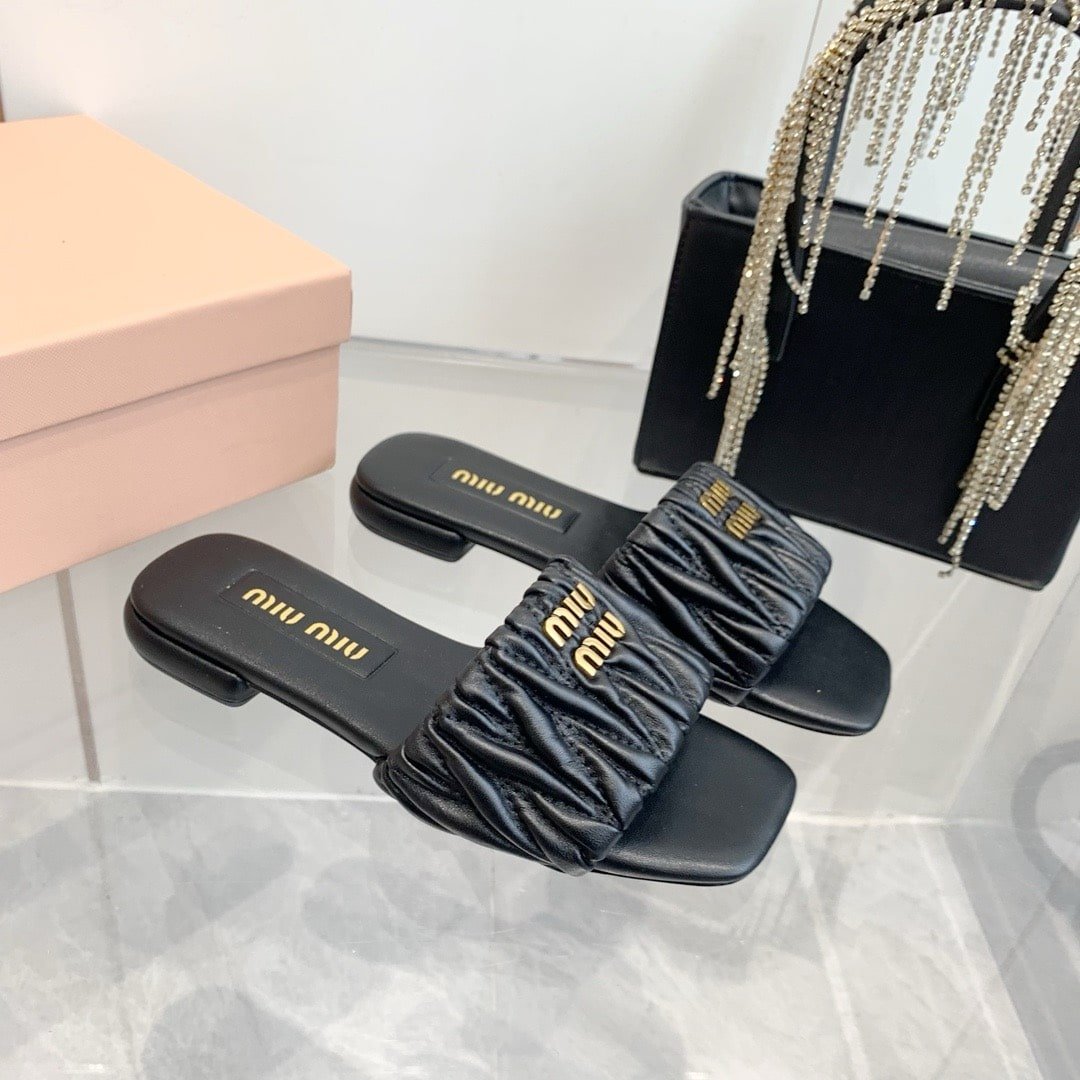 M1um1u Matelassé Nappa Leather Slides Black