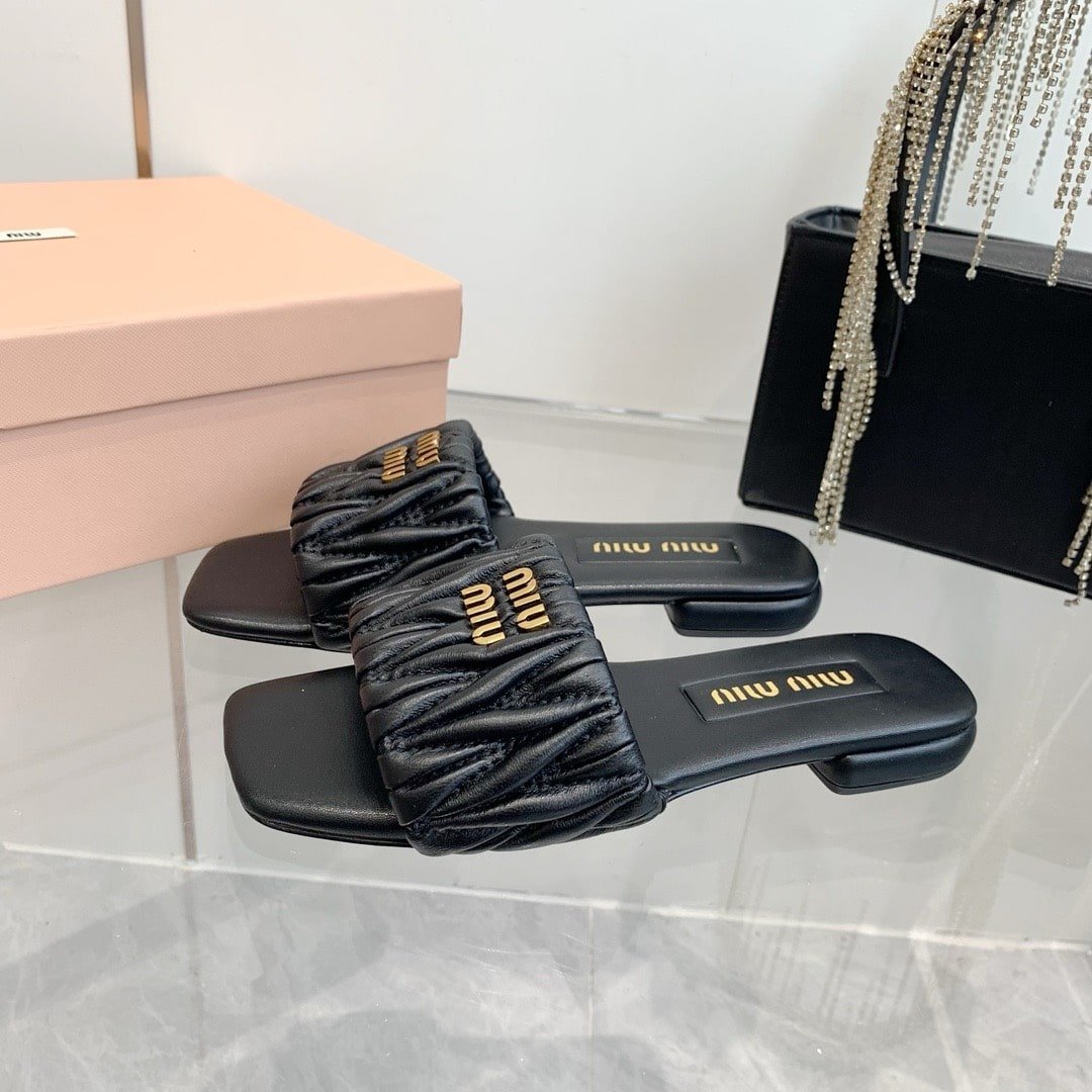M1um1u Matelassé Nappa Leather Slides Black