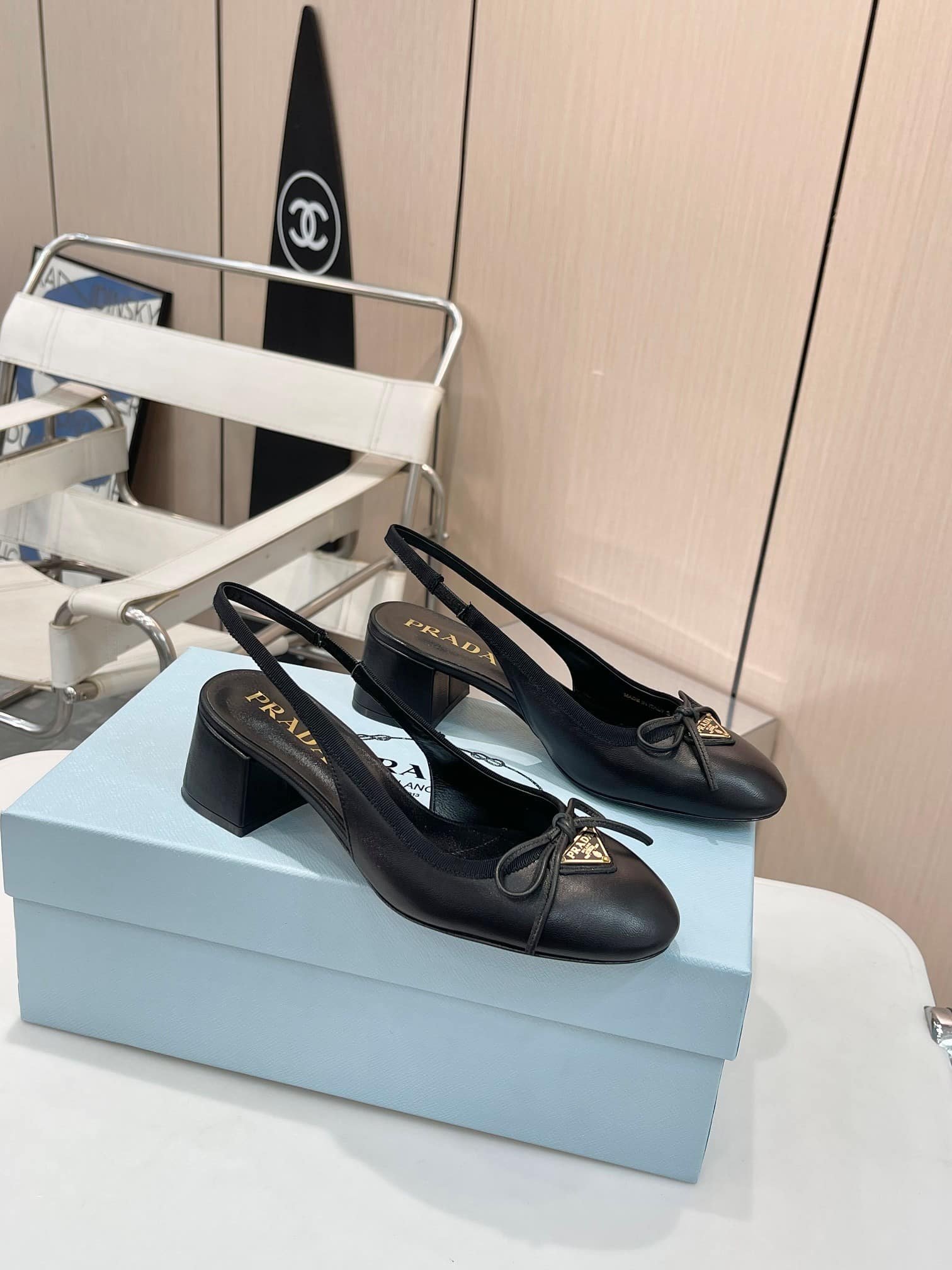 Pra*a Triangle Logo Bow Slingback Pump In Black