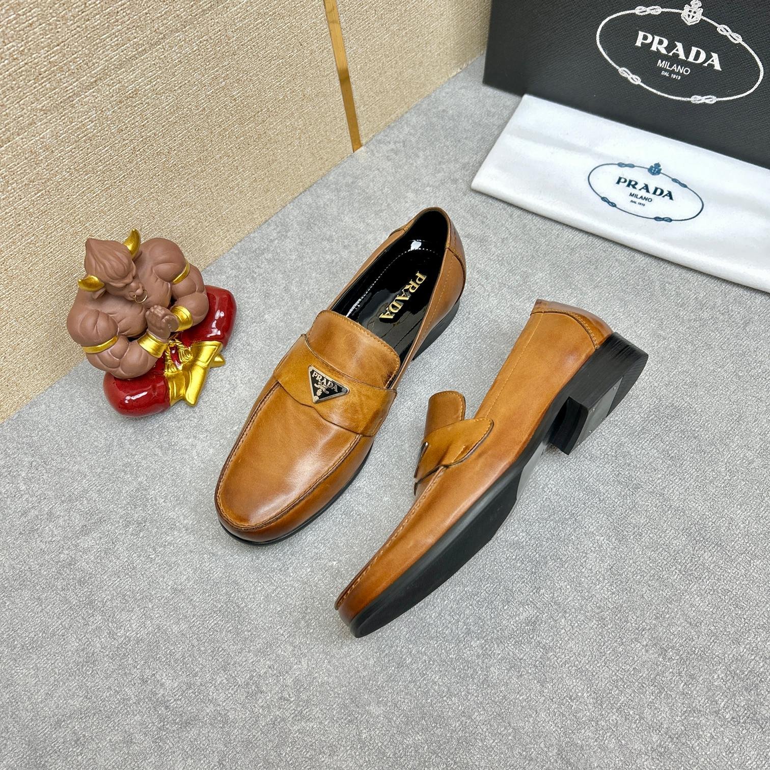 Pra*a Brushed Leather Loafers Triangle Logo Brown