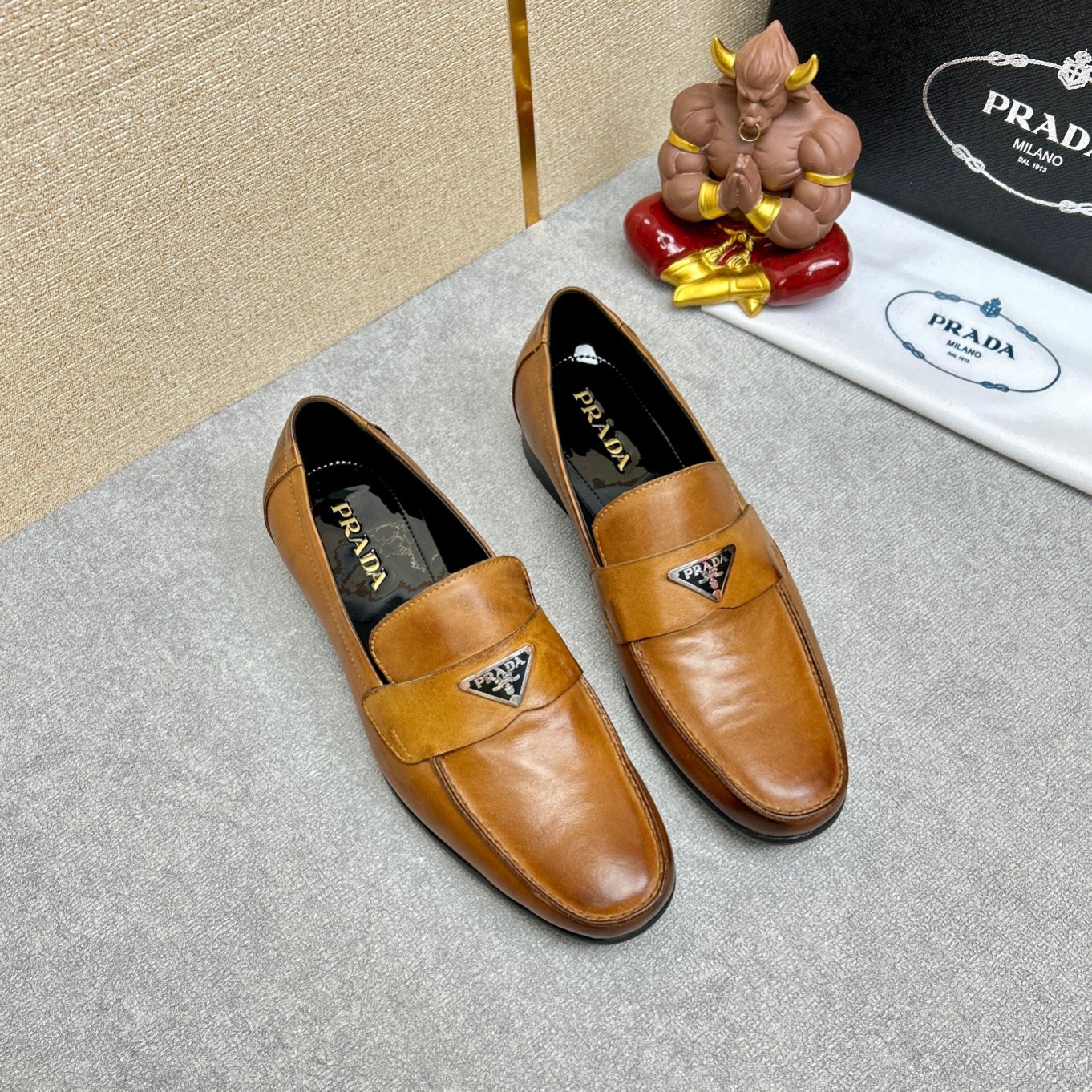 Pra*a Brushed Leather Loafers Triangle Logo Brown