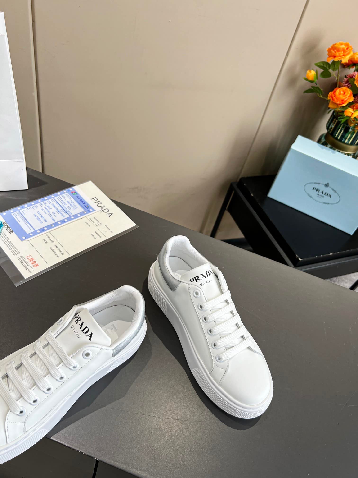 Pra*a Sneaker In White Leather With Silver Logo