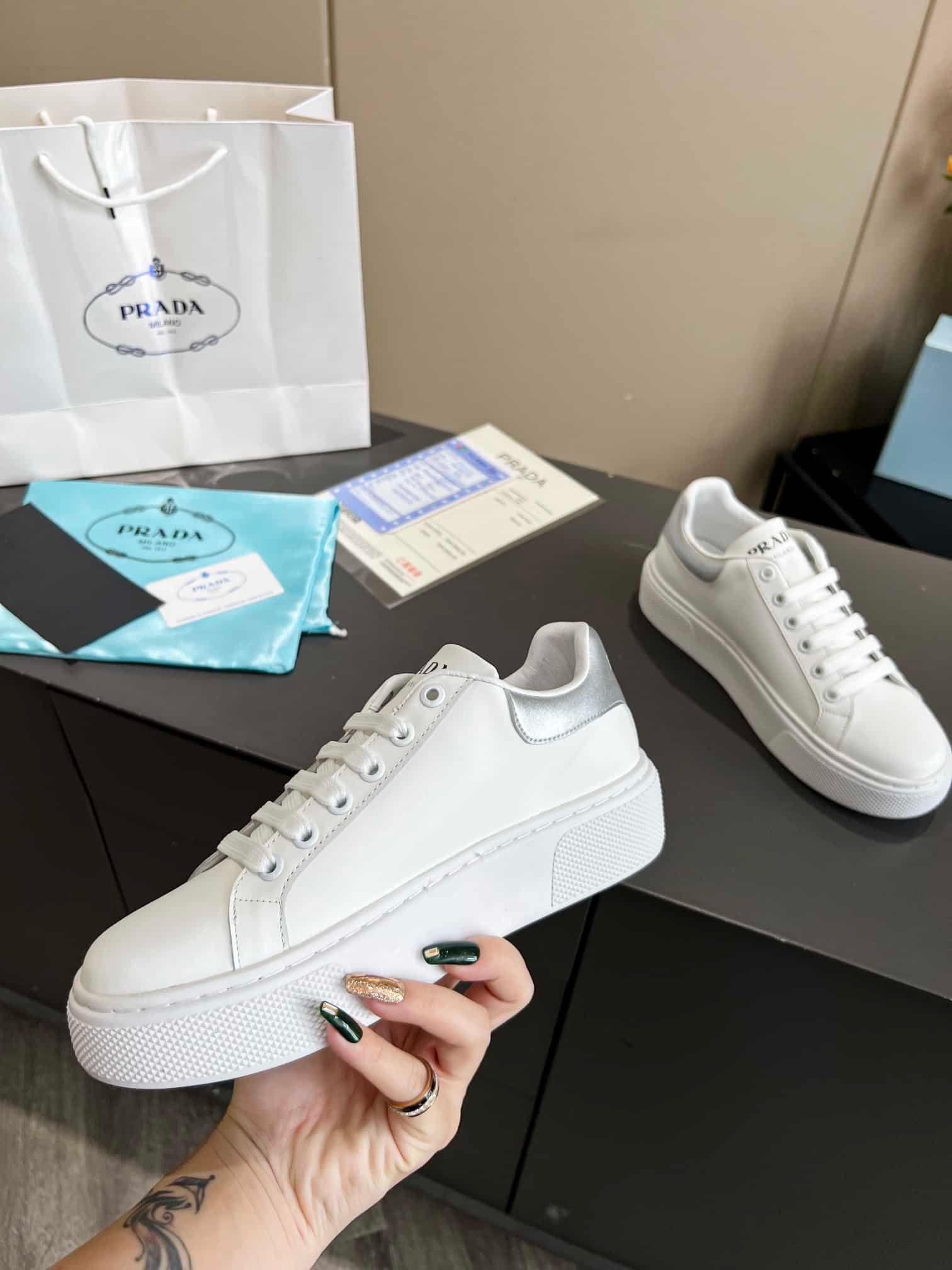 Pra*a Sneaker In White Leather With Silver Logo