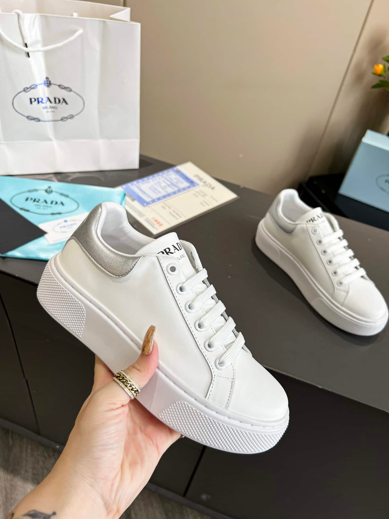 Pra*a Sneaker In White Leather With Silver Logo