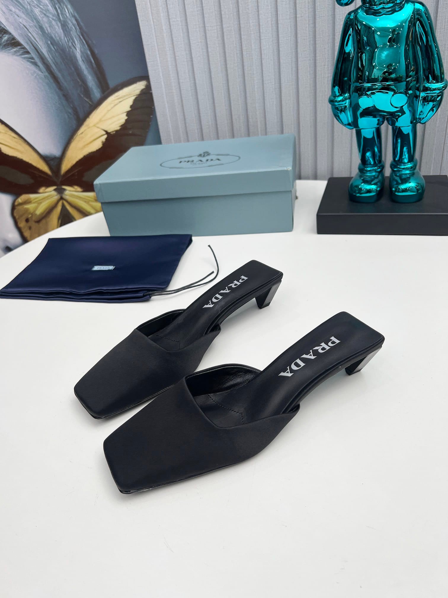 Pra*a Leather Mules Black