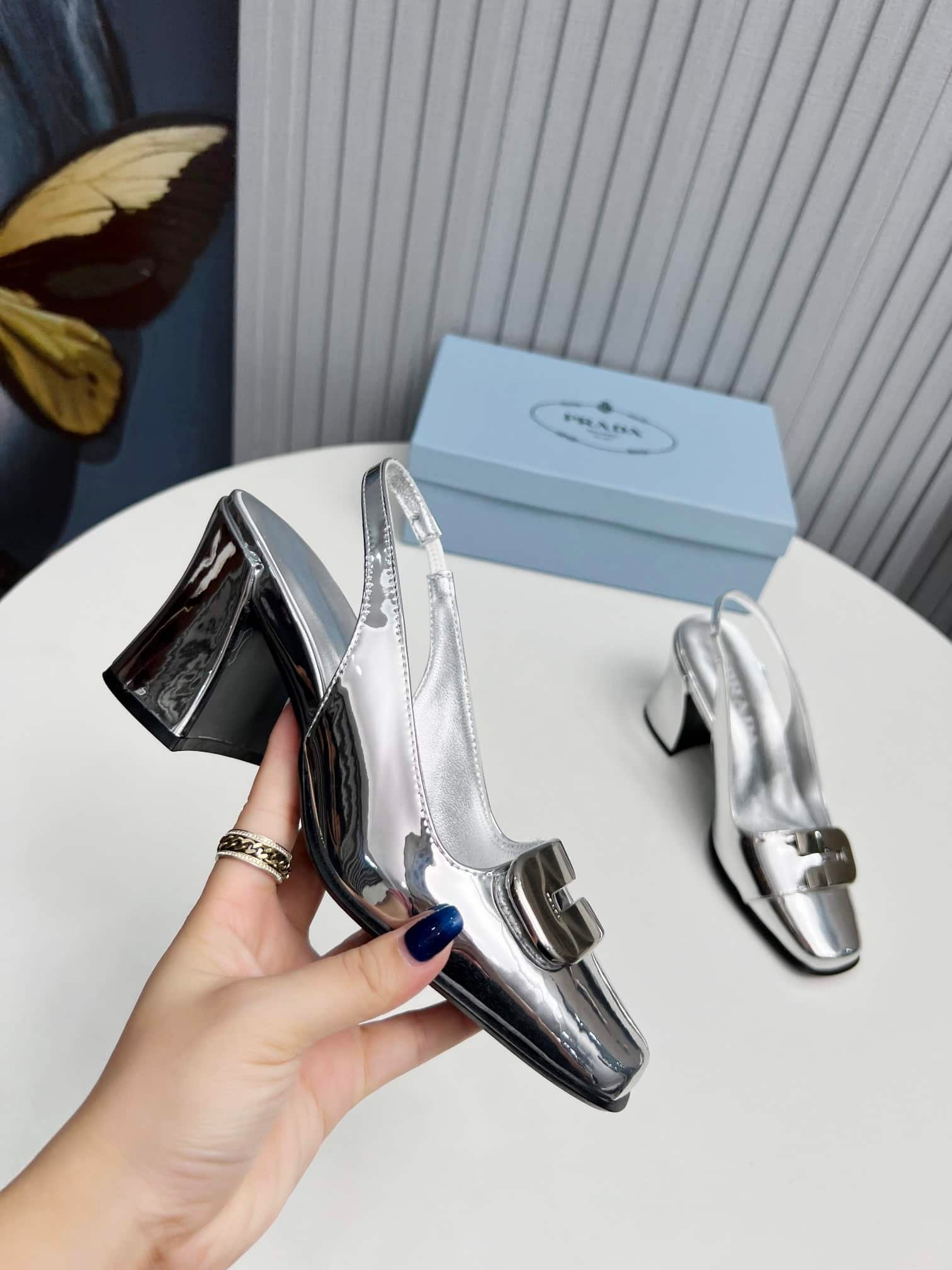 Pra*a Leather Slingback Pumps Silver