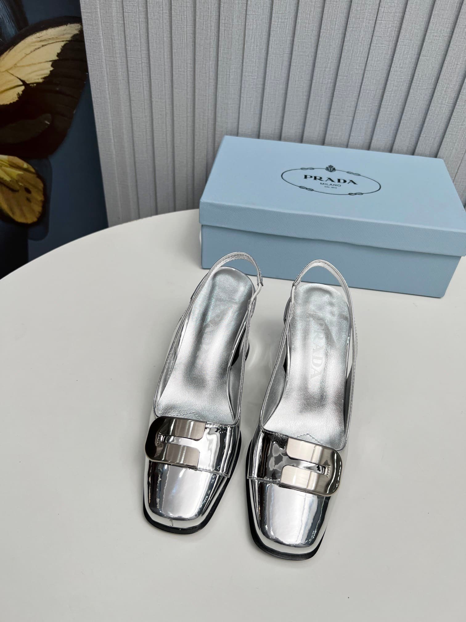 Pra*a Leather Slingback Pumps Silver