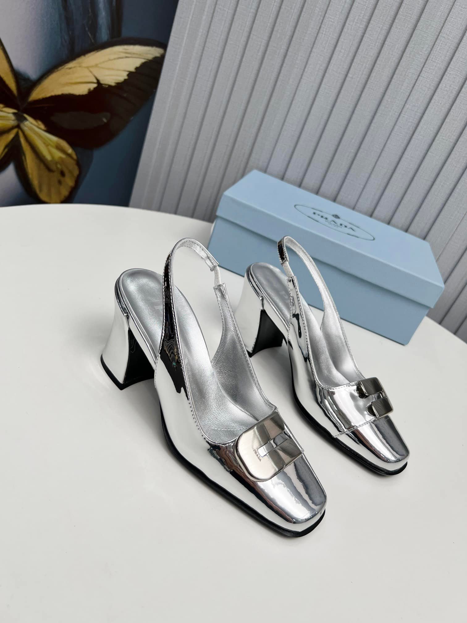 Pra*a Leather Slingback Pumps Silver