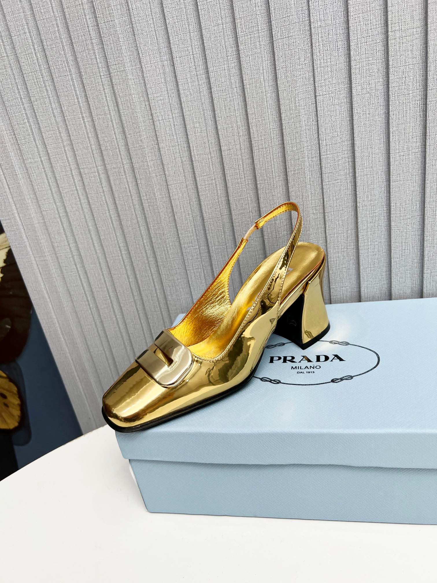Pra*a Leather Slingback Pumps Gold